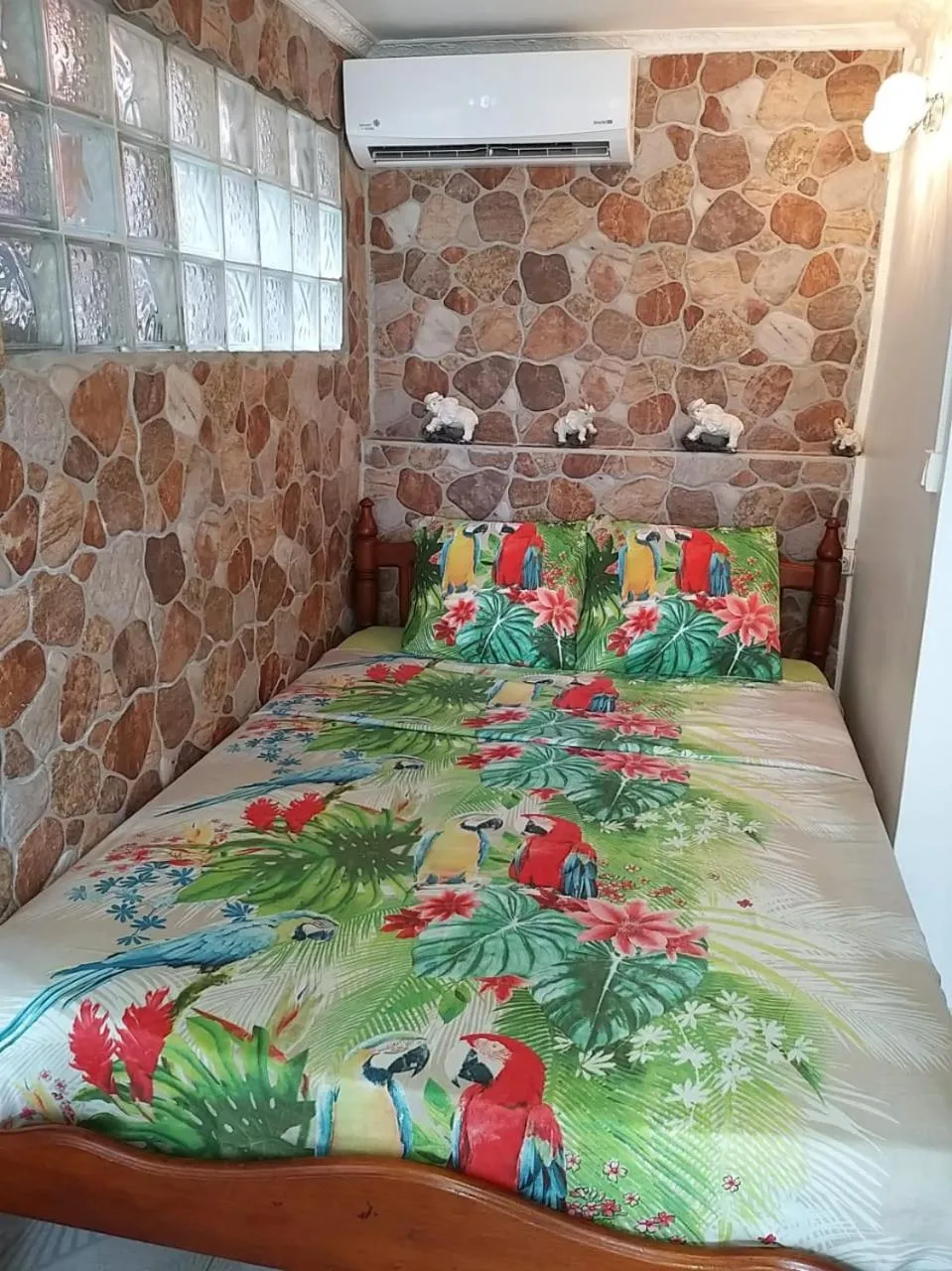 Bed in KANALU BEACH APPATEMENT