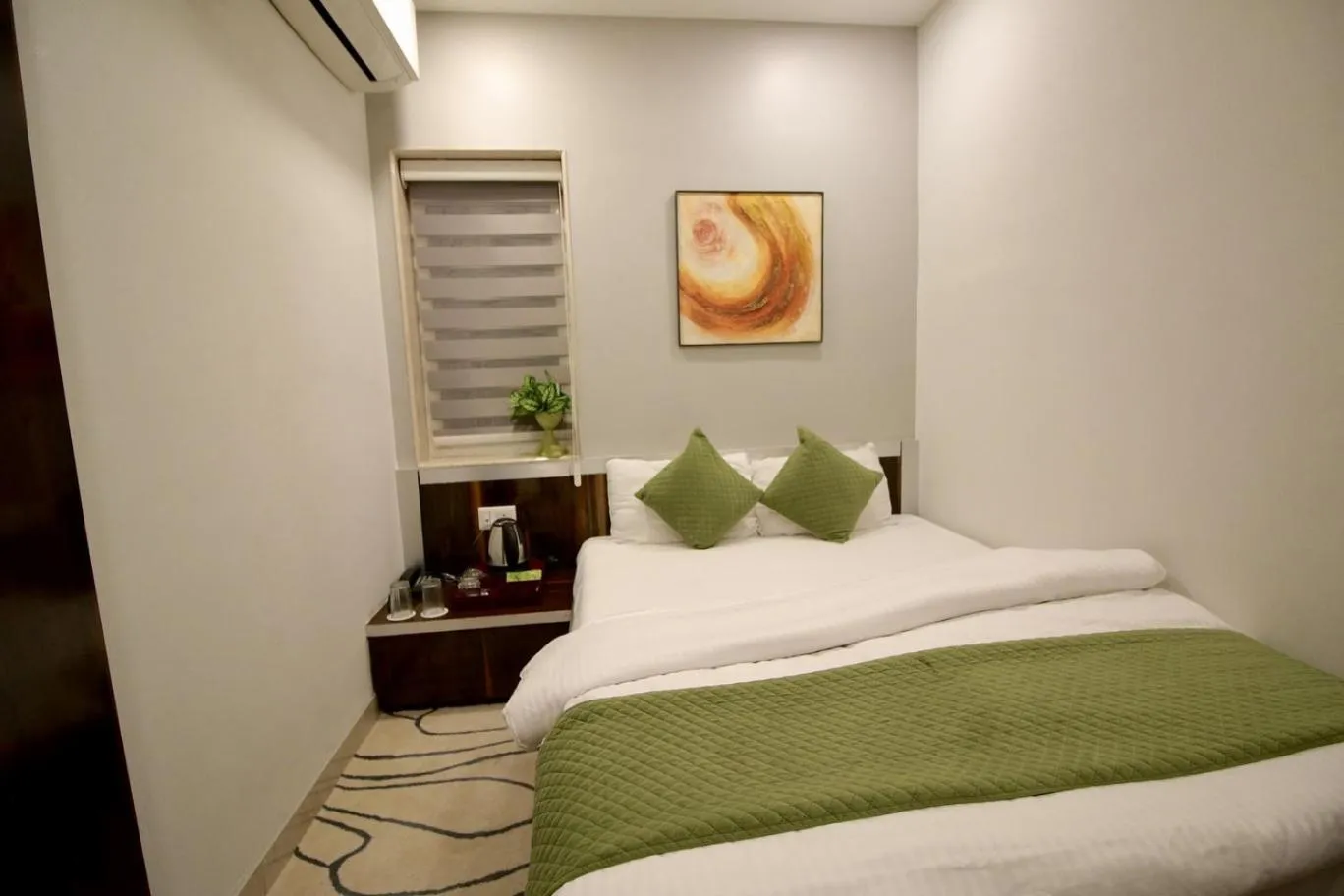 Bed in Evara-Meraki Inn