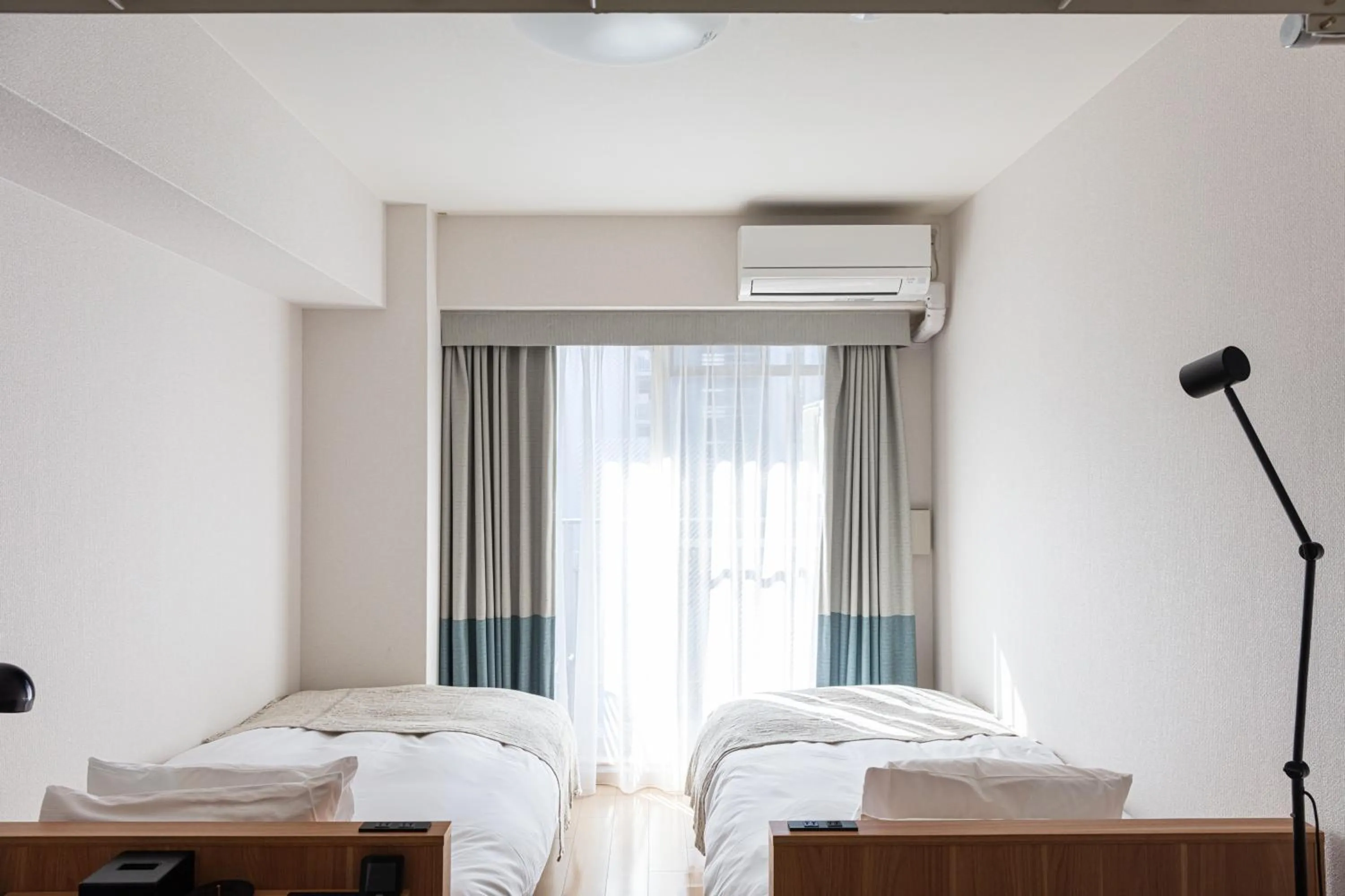 Bedroom, Bed in yksi STAY ＆ APARTMENT OSAKA