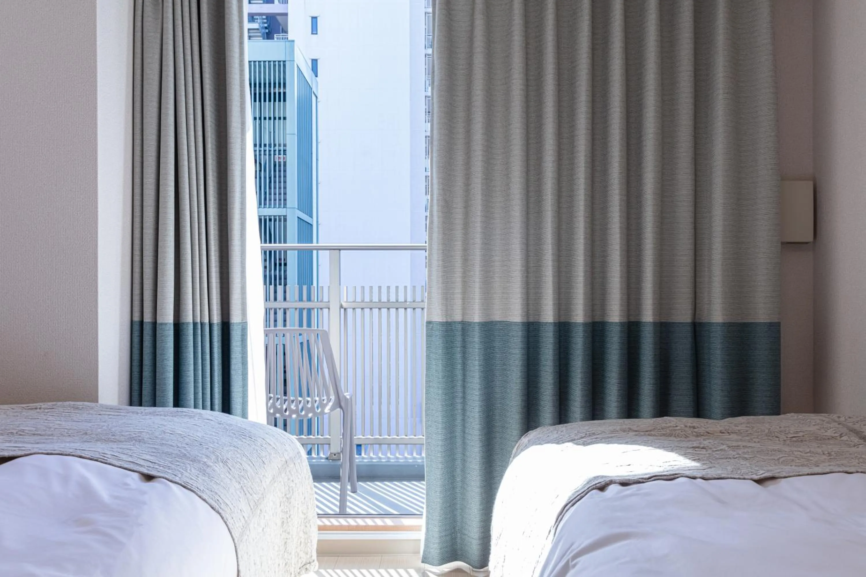 Bed in yksi STAY ＆ APARTMENT OSAKA