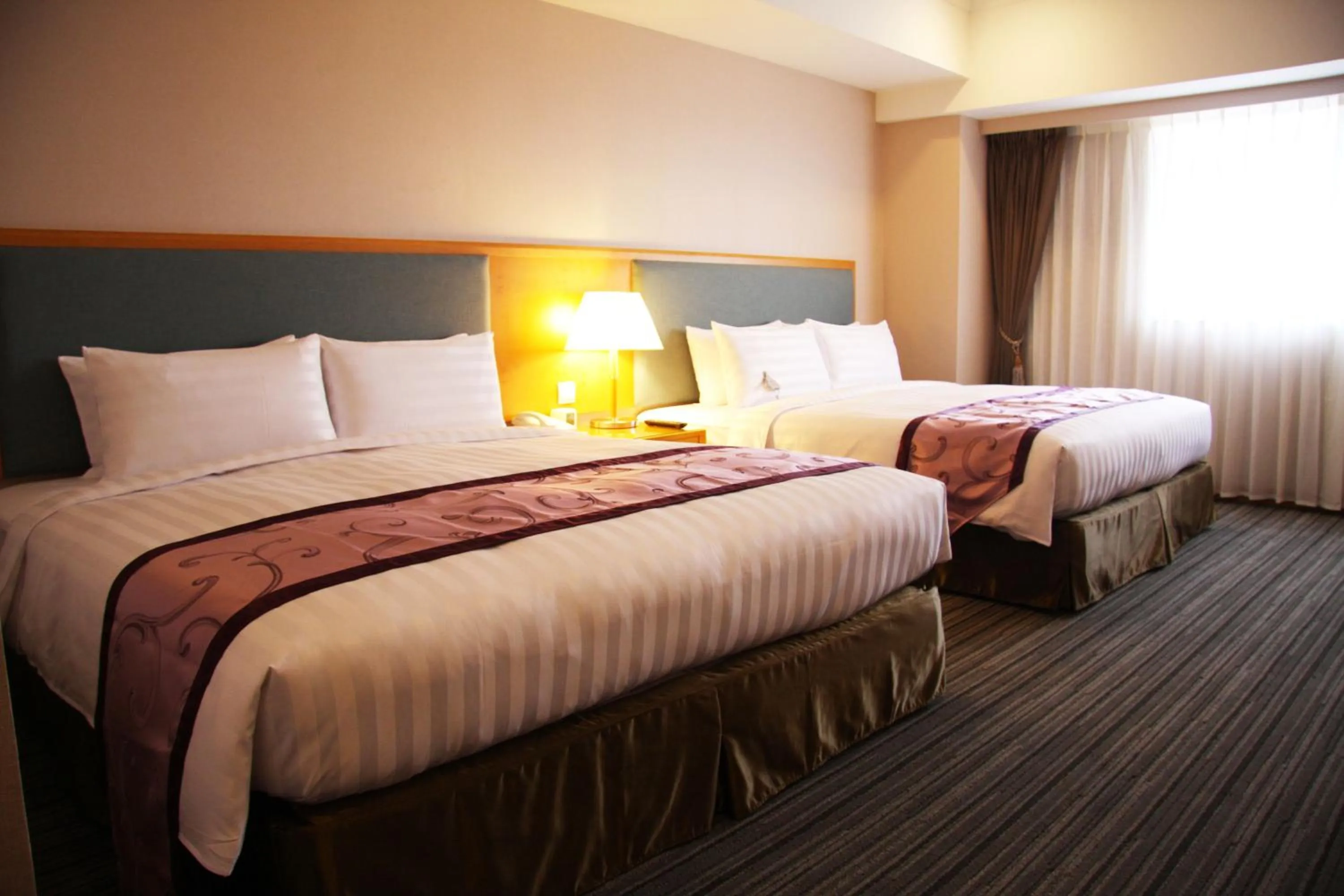 Bed in Fushin Hotel - Tainan