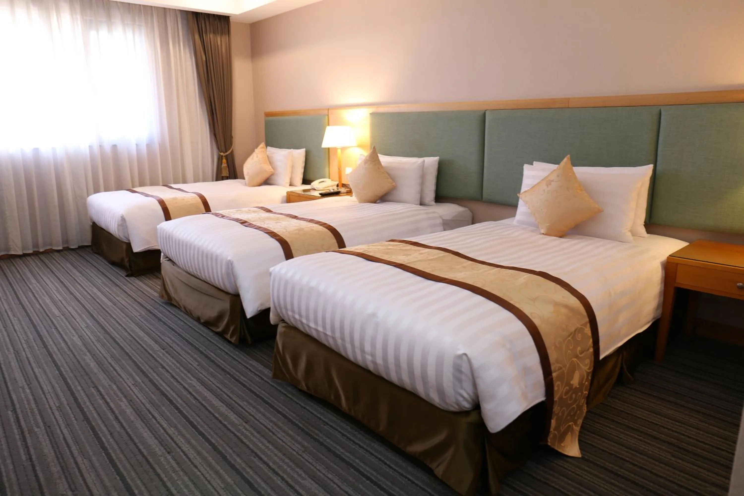 Bed in Fushin Hotel - Tainan