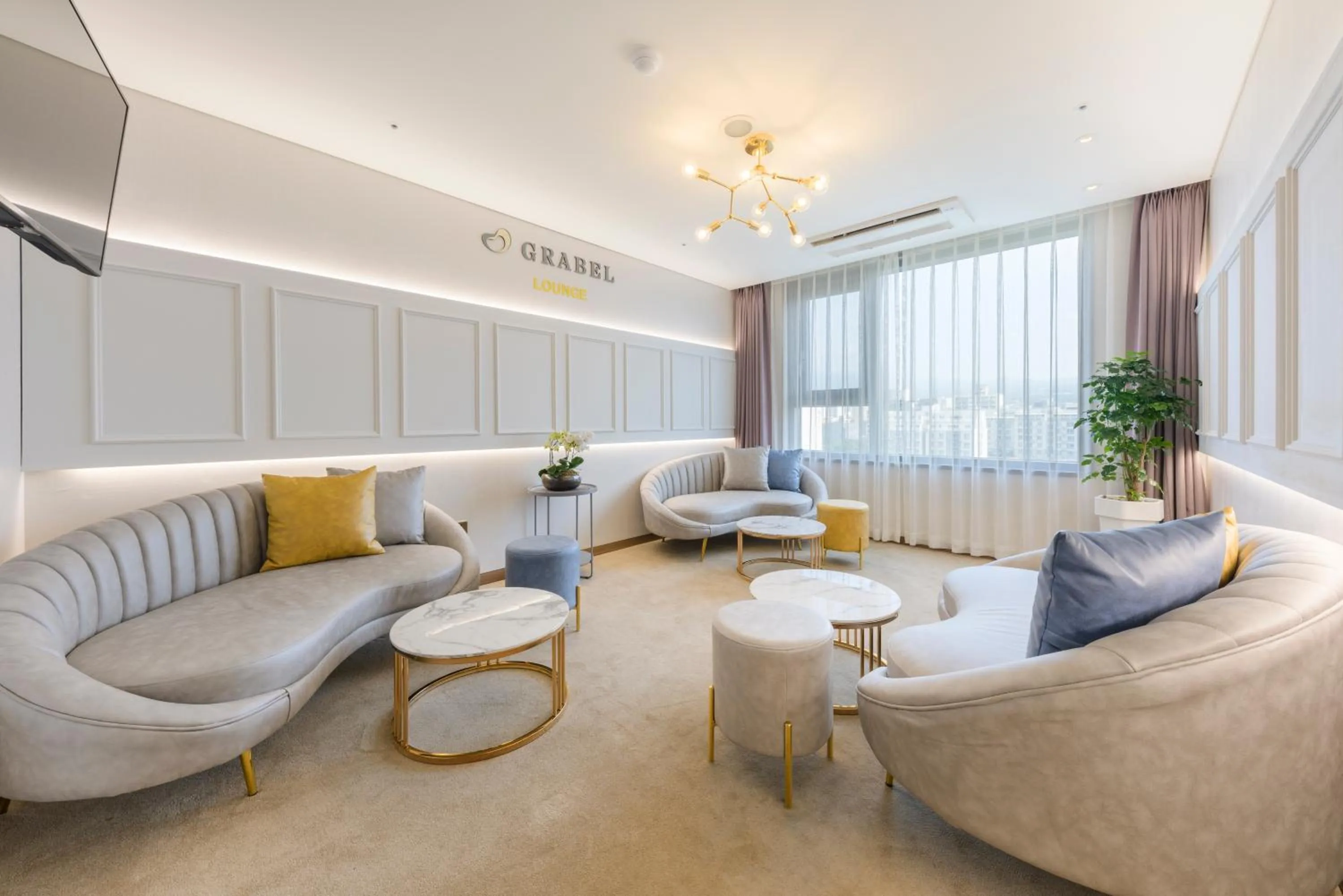 Communal lounge/ TV room in Grabel Hotel Jeju