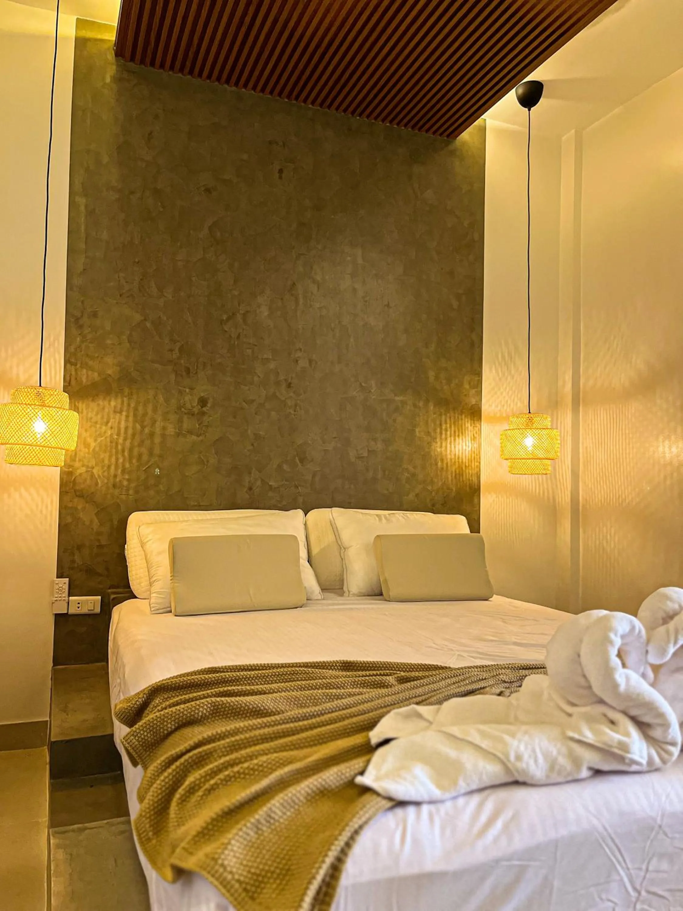 Bed in Go Boutique Inn