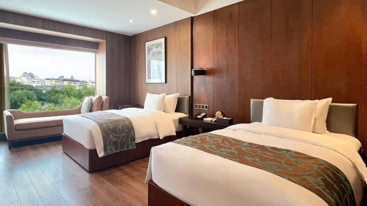 Bed in Jolie Vue Boutique Hotel Guilin (near Elephant Trunk Hill)