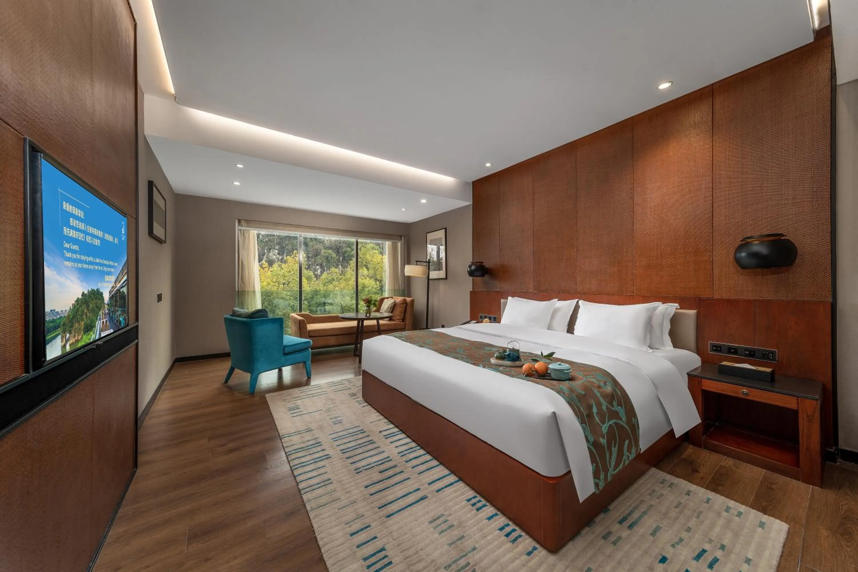 Communal lounge/ TV room, Bed in Jolie Vue Boutique Hotel Guilin (near Elephant Trunk Hill)