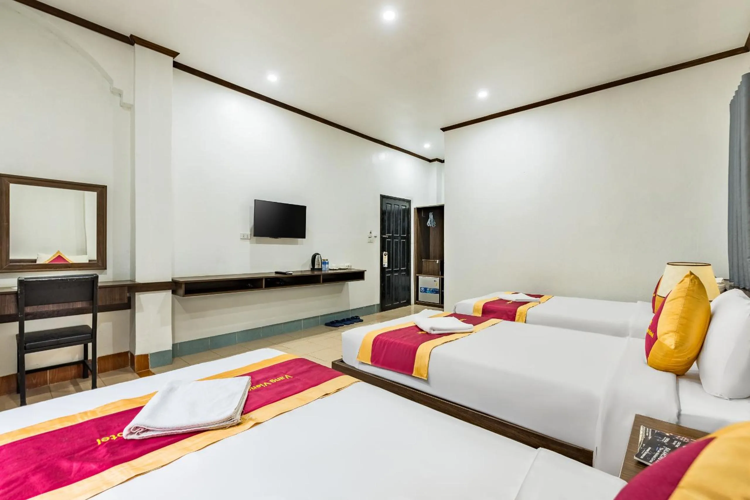 Bed in VangVieng Charming Boutique Hotel
