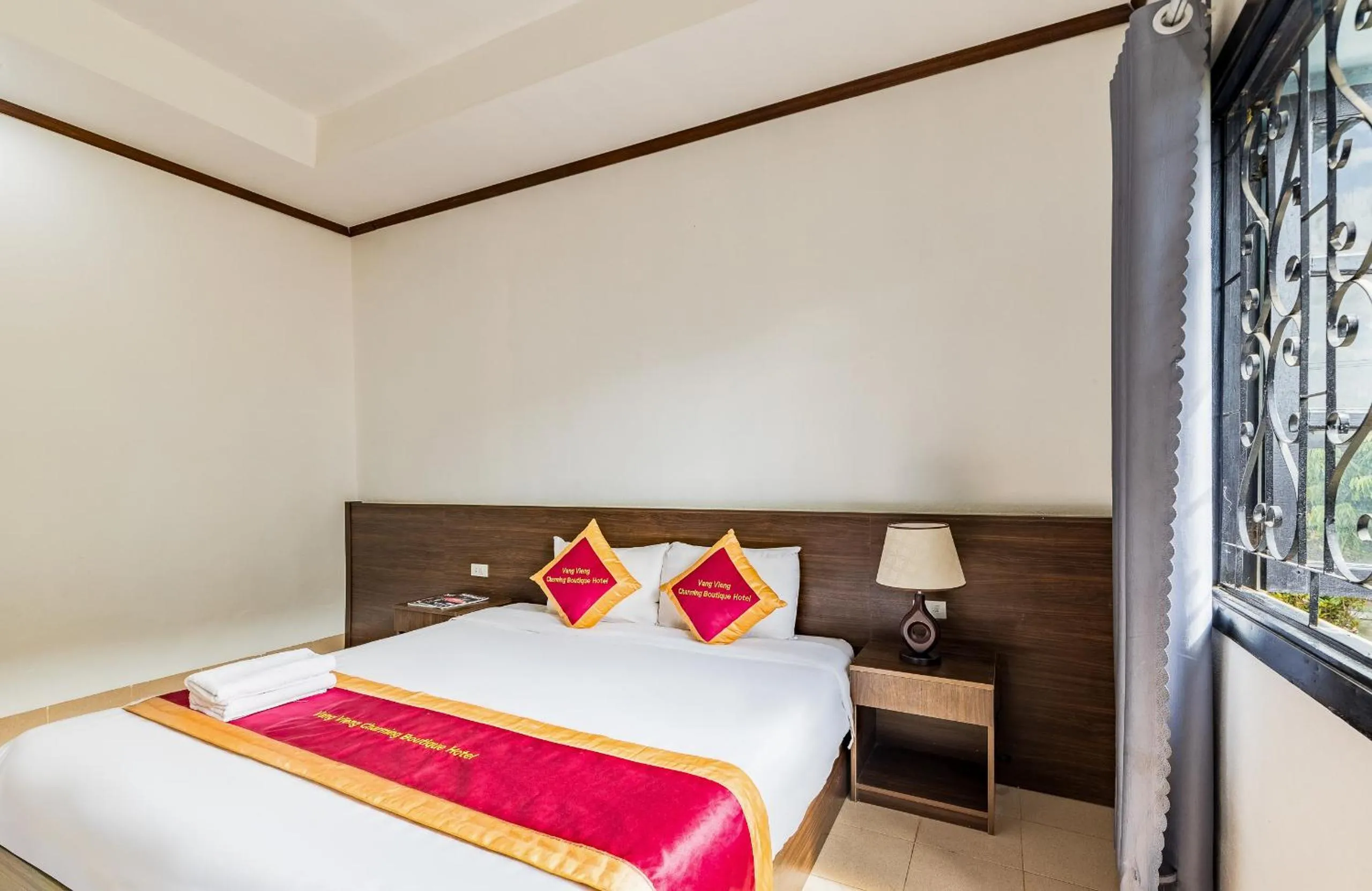 Bed in VangVieng Charming Boutique Hotel
