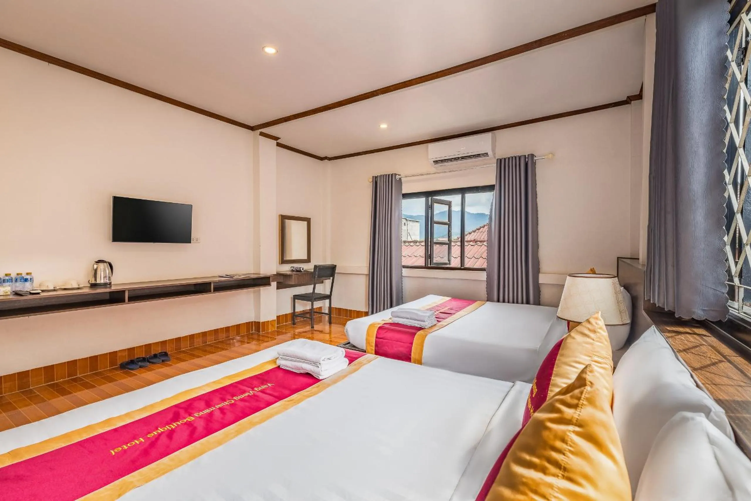 Bed in VangVieng Charming Boutique Hotel