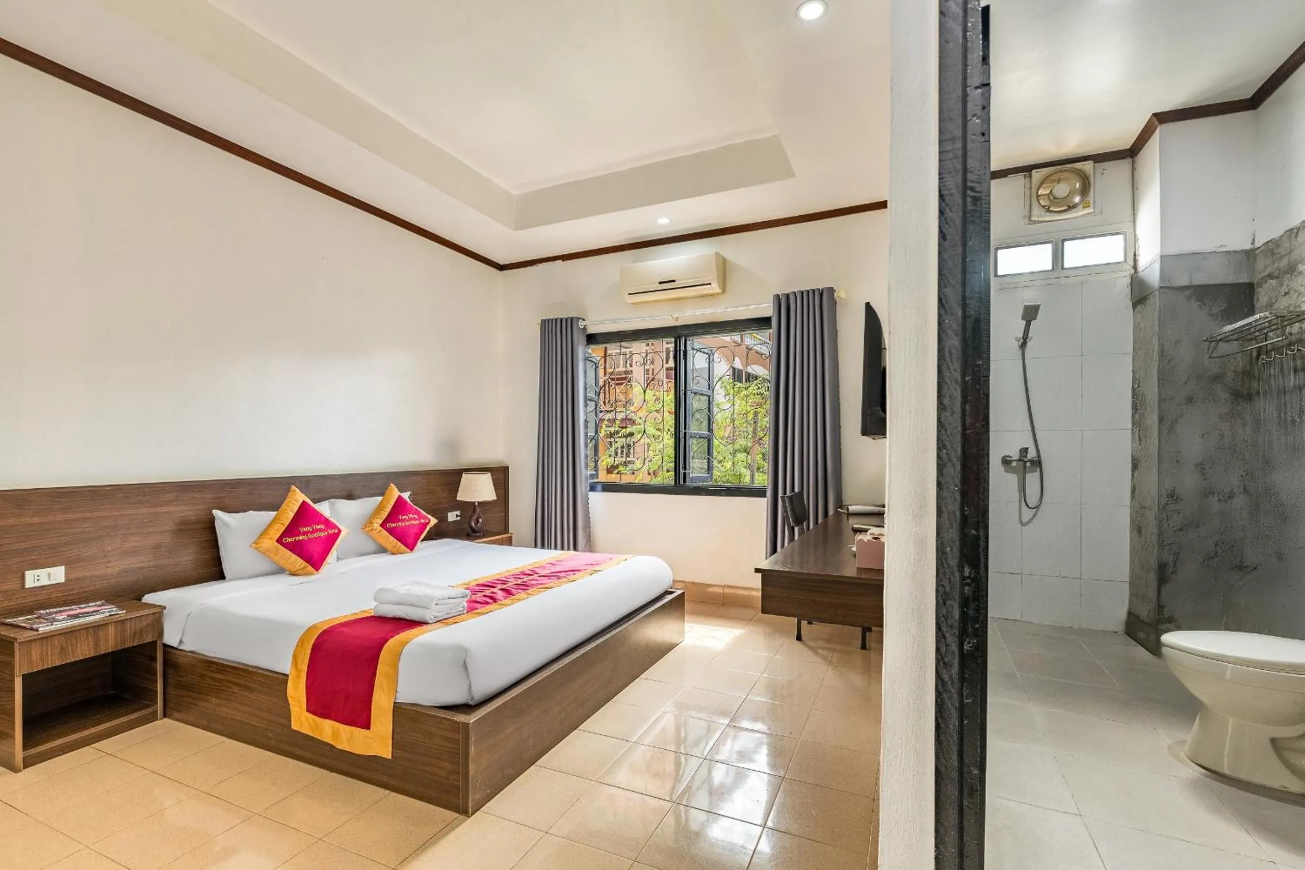 Bed in VangVieng Charming Boutique Hotel