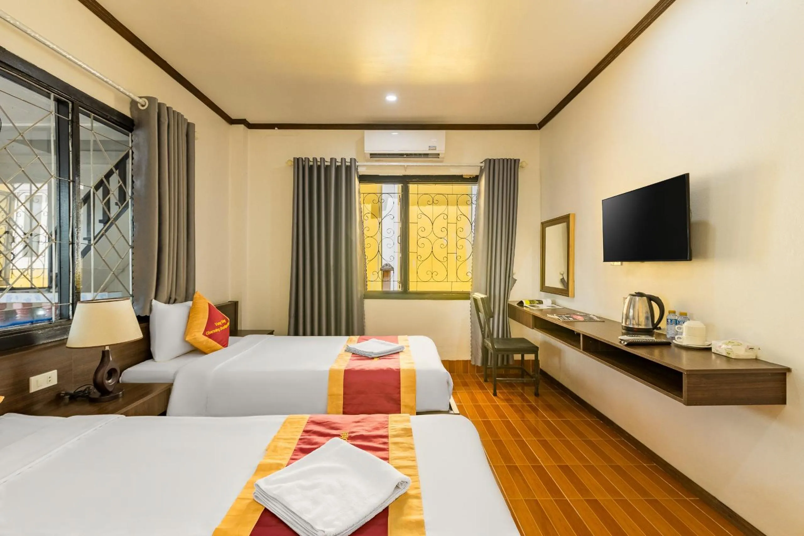 Bed in VangVieng Charming Boutique Hotel