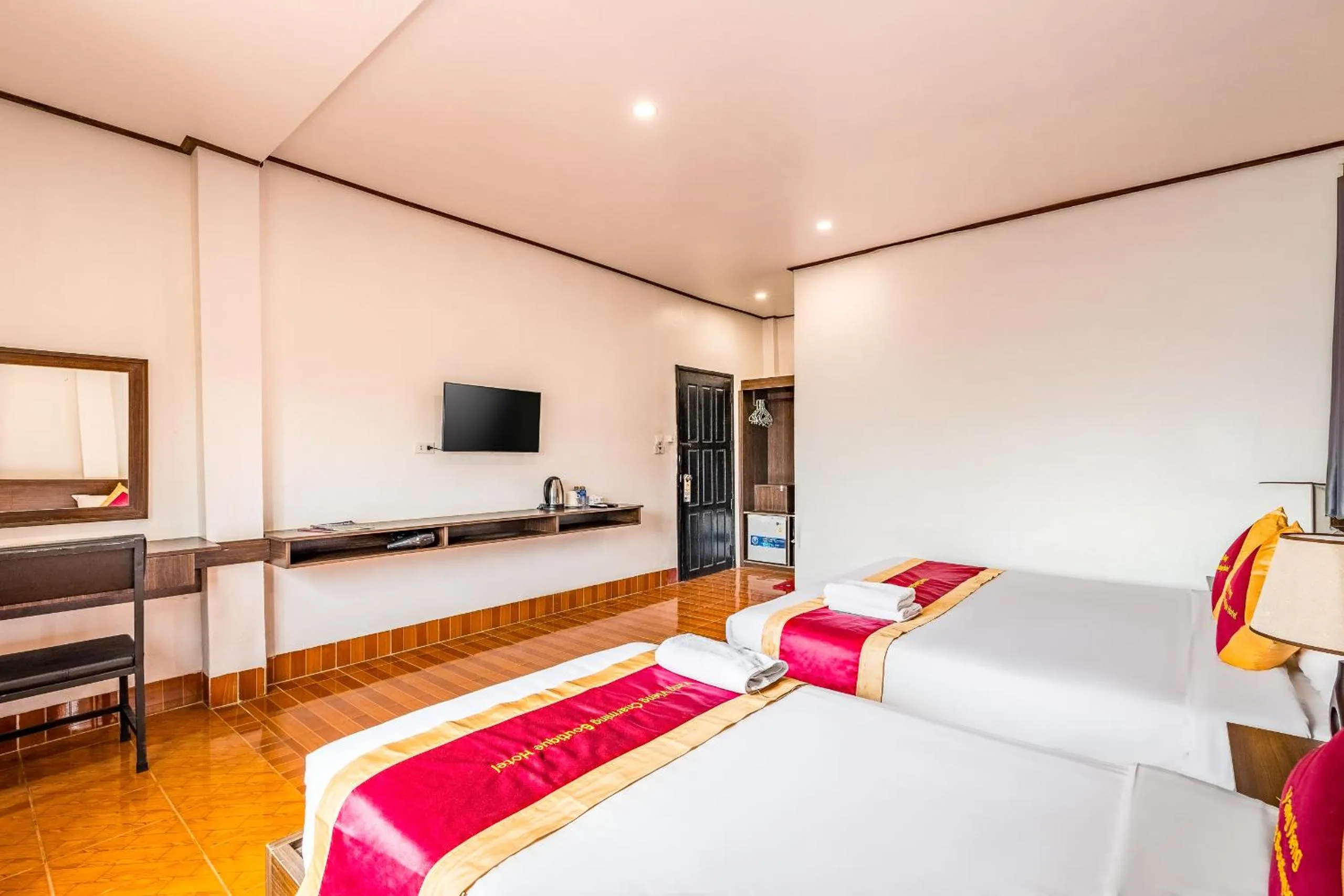 Bed in VangVieng Charming Boutique Hotel