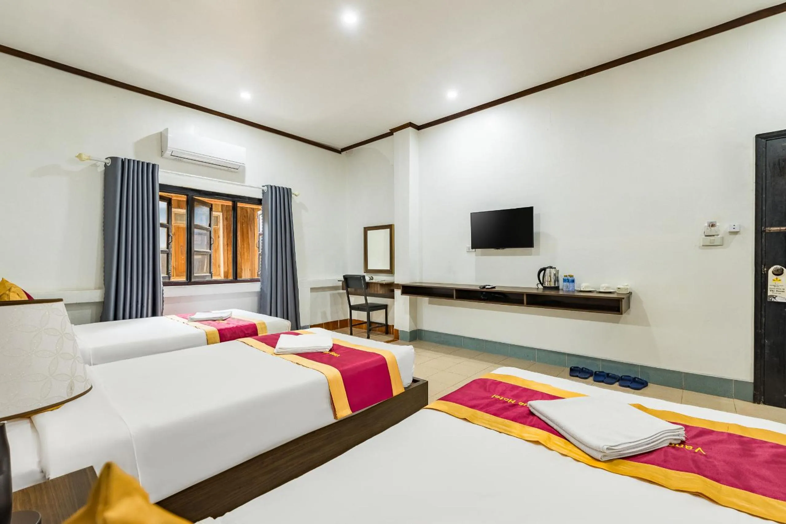 Bed in VangVieng Charming Boutique Hotel