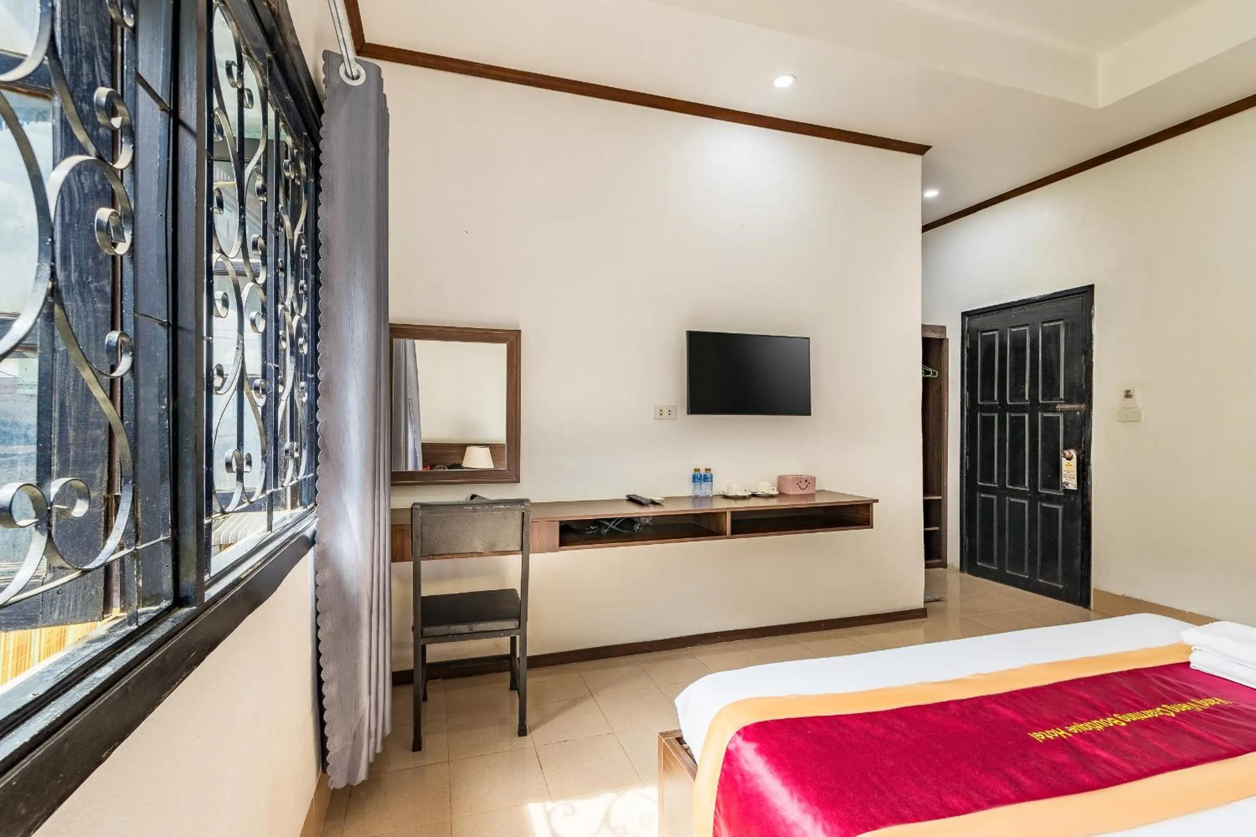 Bed in VangVieng Charming Boutique Hotel