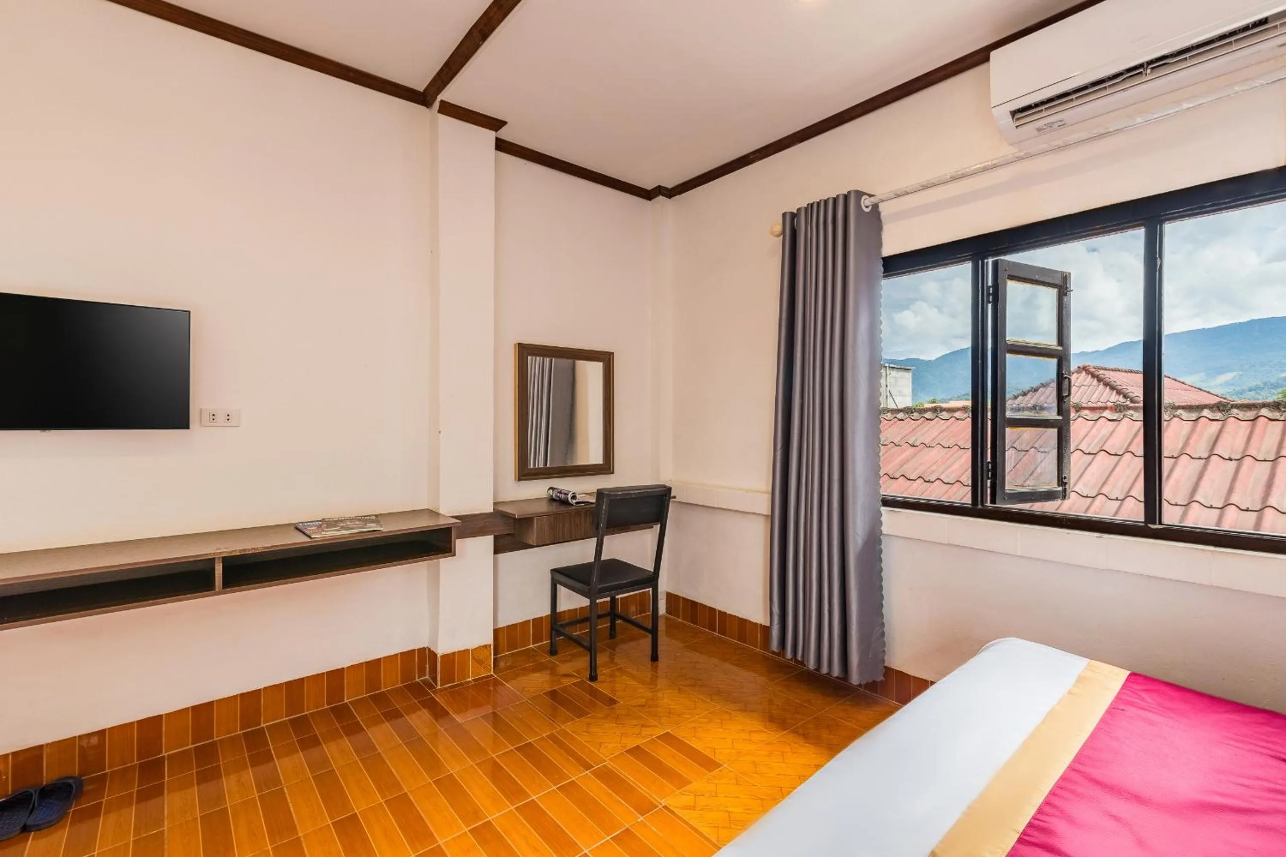 Bed in VangVieng Charming Boutique Hotel