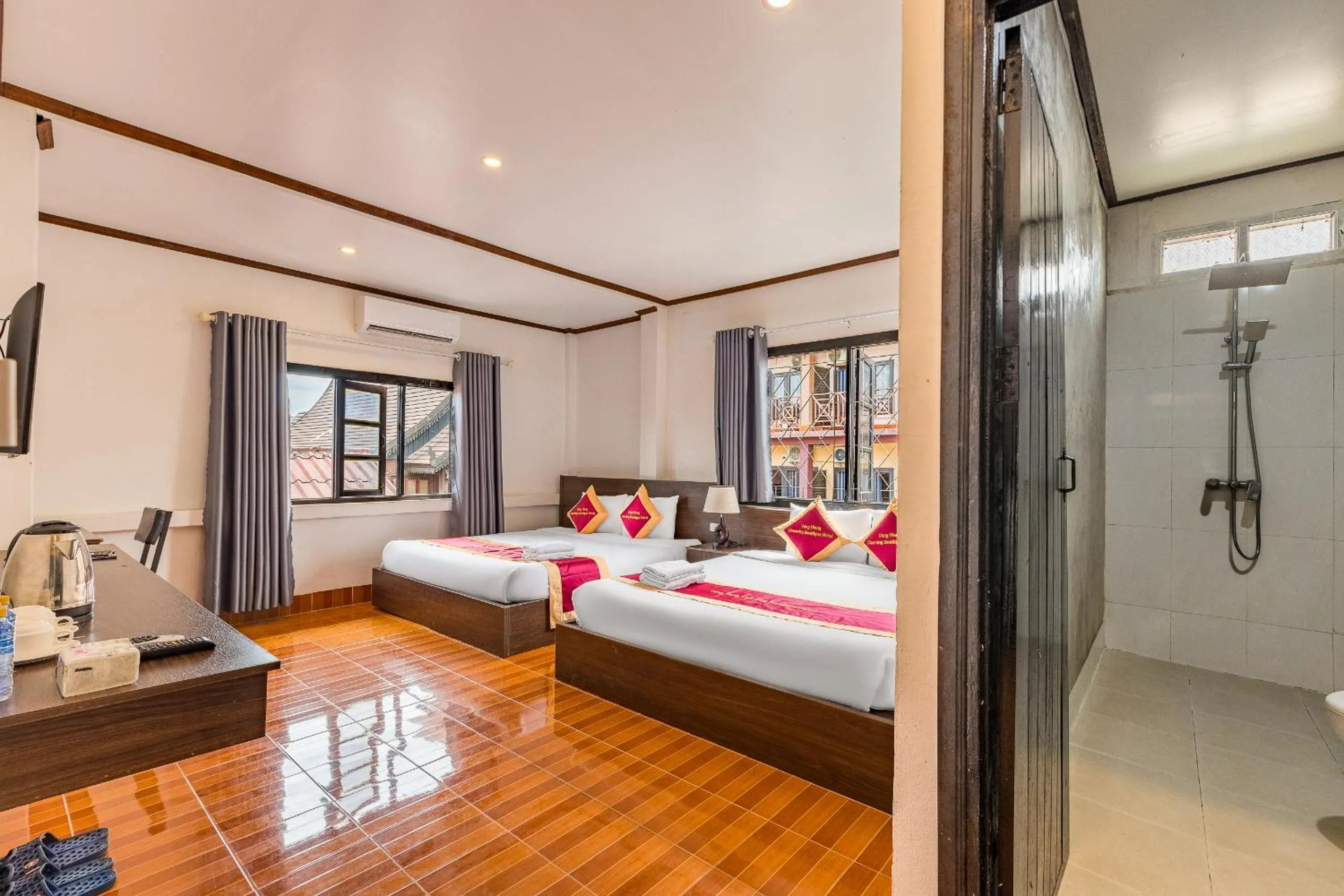 Bed in VangVieng Charming Boutique Hotel