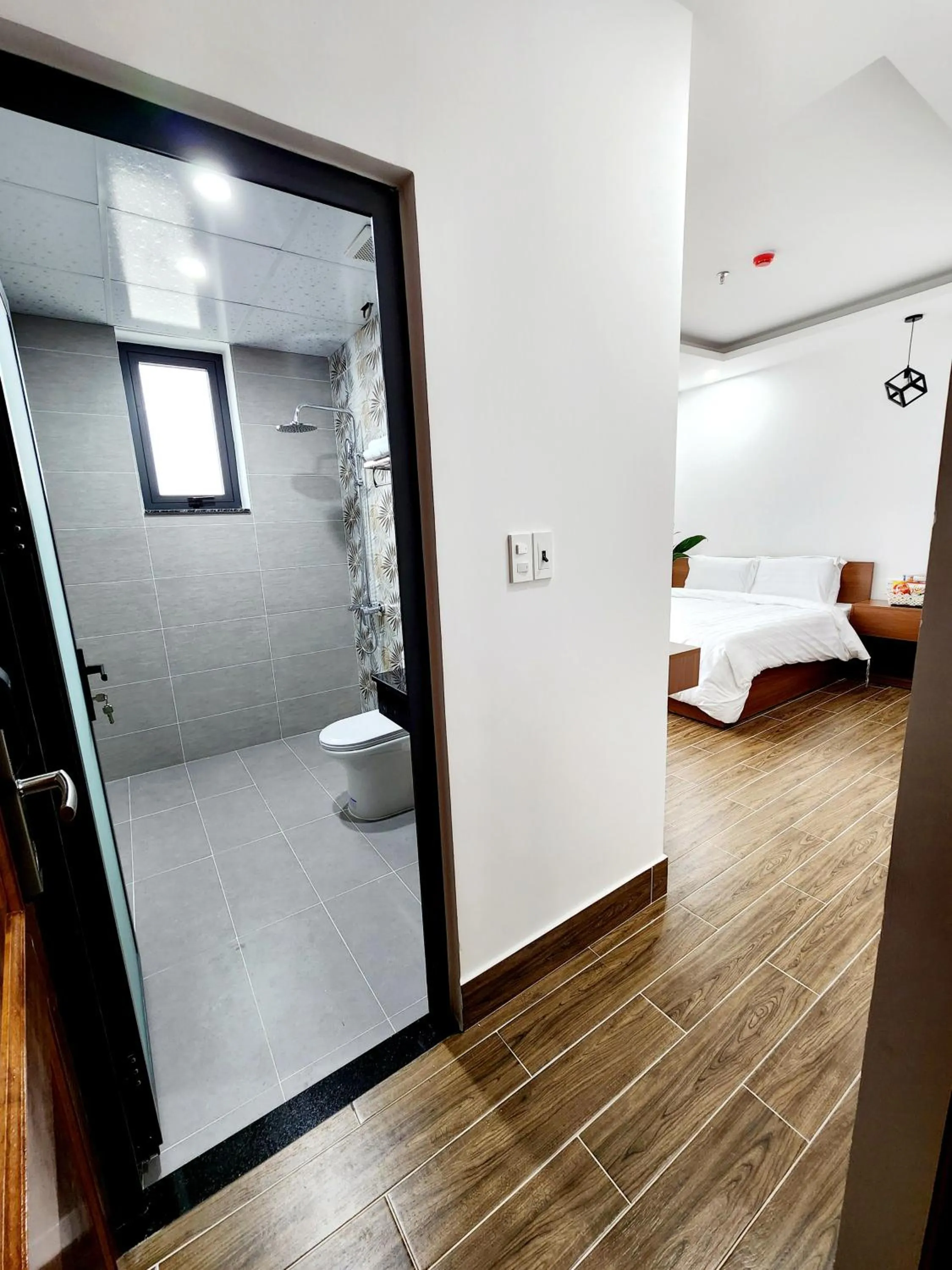Toilet, Bed in Happy Bun Hotel Da Lat