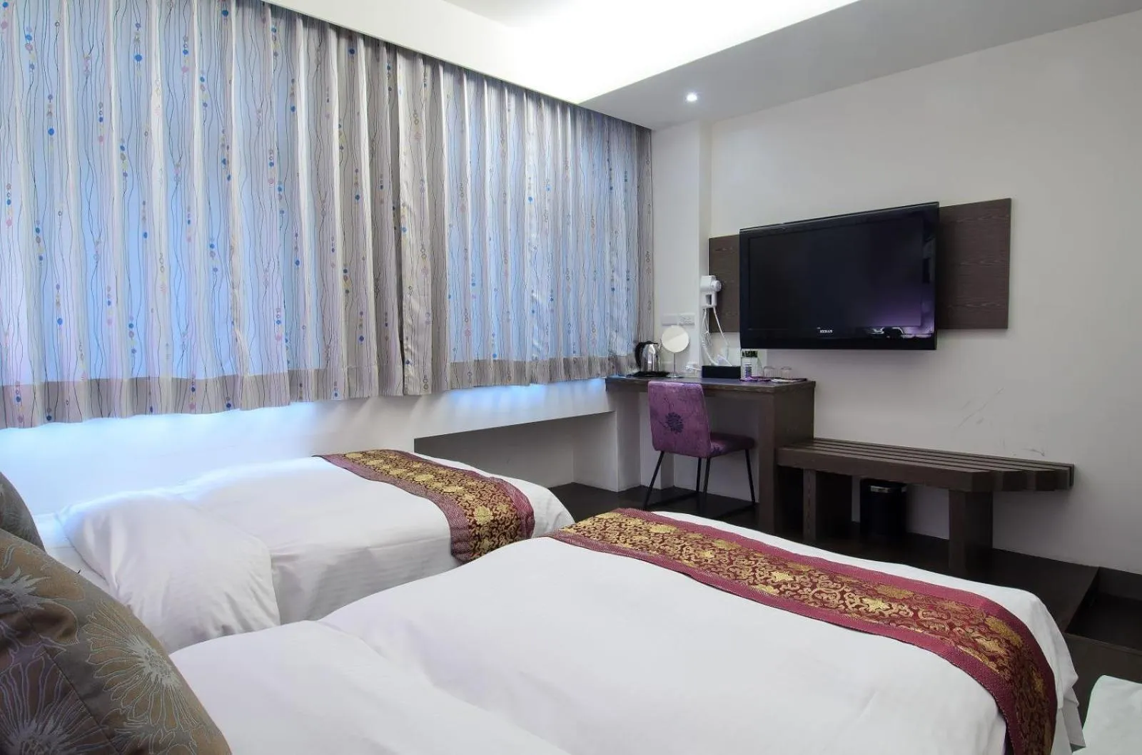 Bed in Yuh-Tarng Hotel