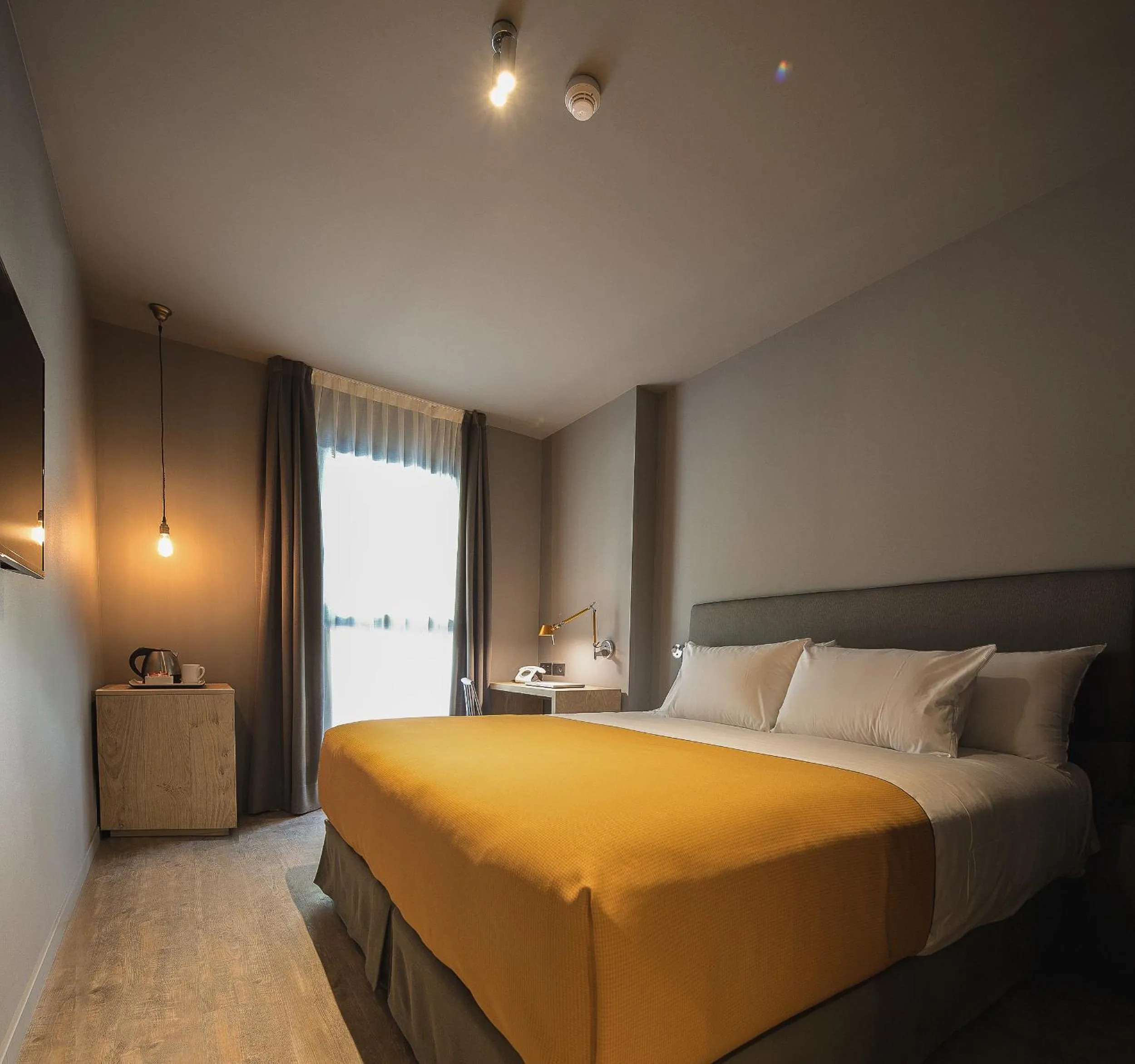 Bed in Yurbban Trafalgar Hotel