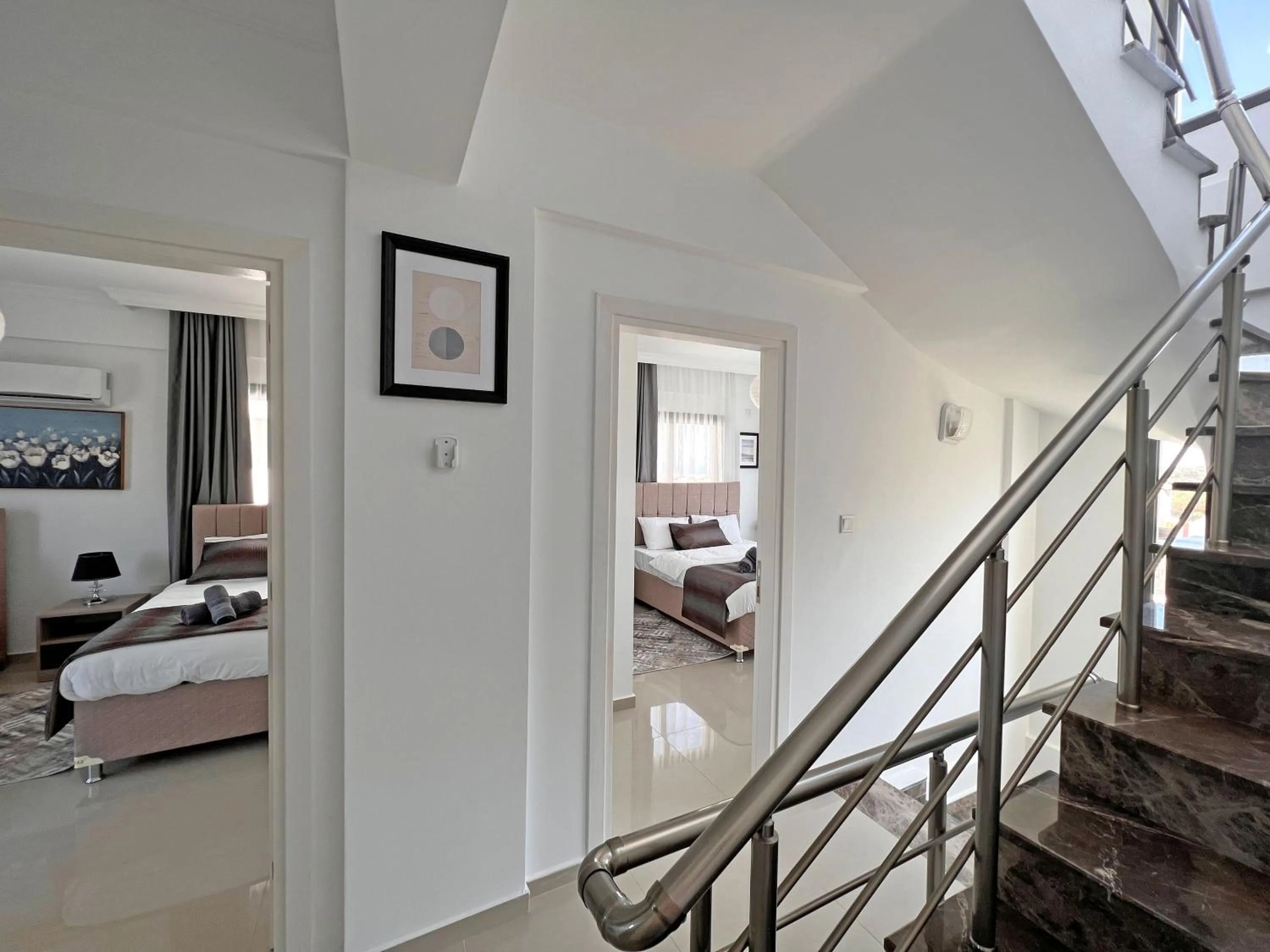 Bed in Skyline Paradise Villas