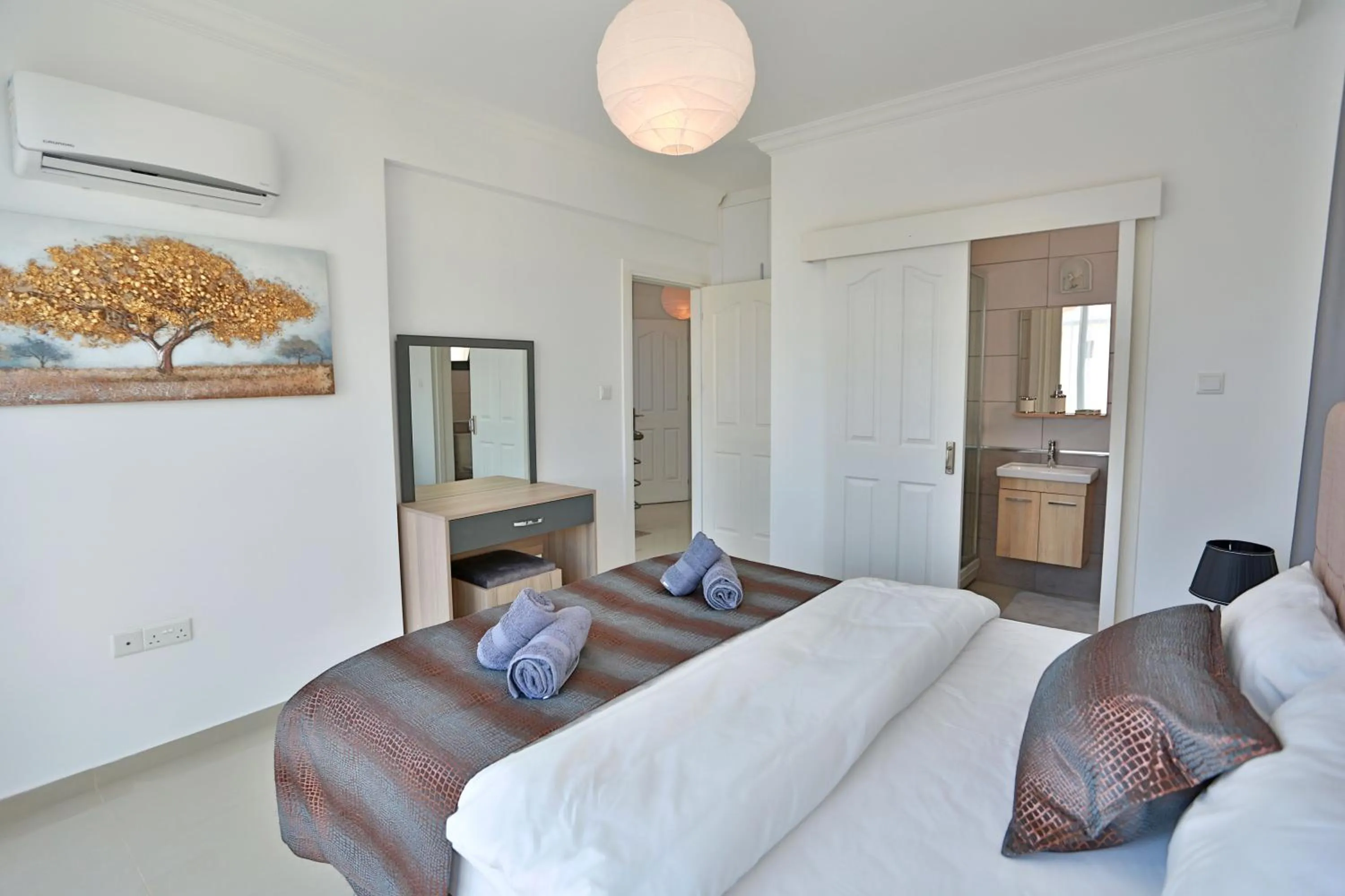 Bed in Skyline Paradise Villas