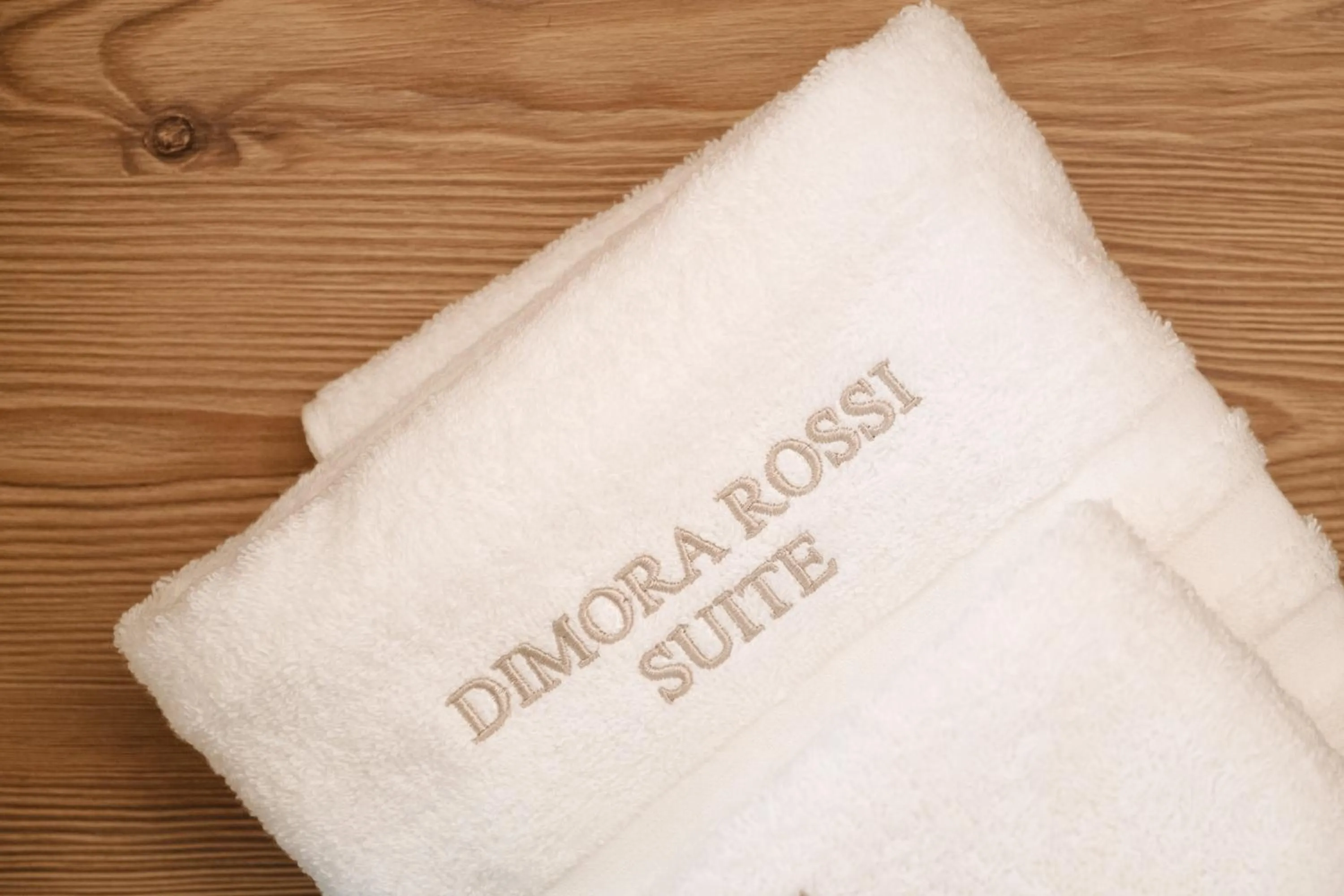 towels in ALBERGO DIFFUSO Dimora Rossi Charme B&B