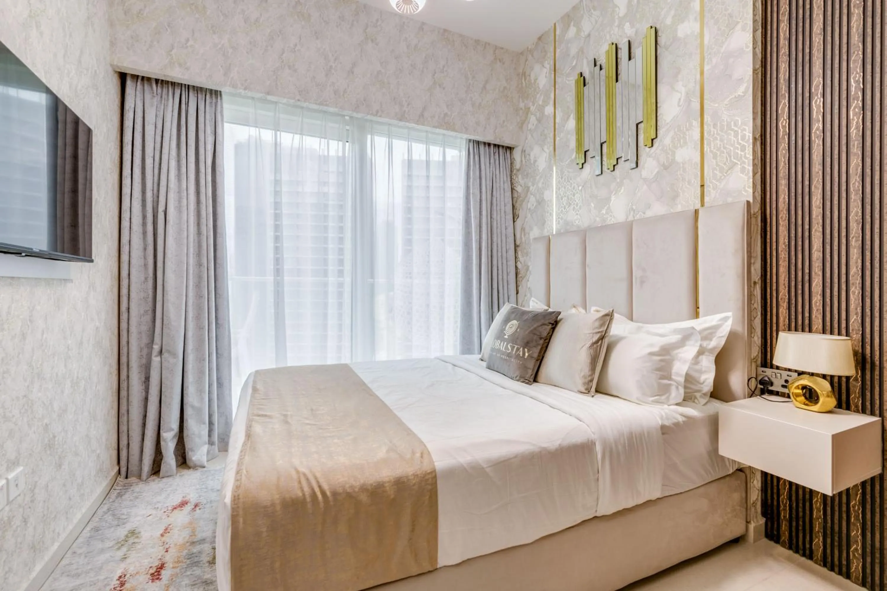 Bed in GLOBALSTAY. Luxury Apartments Near The Dubai Canal