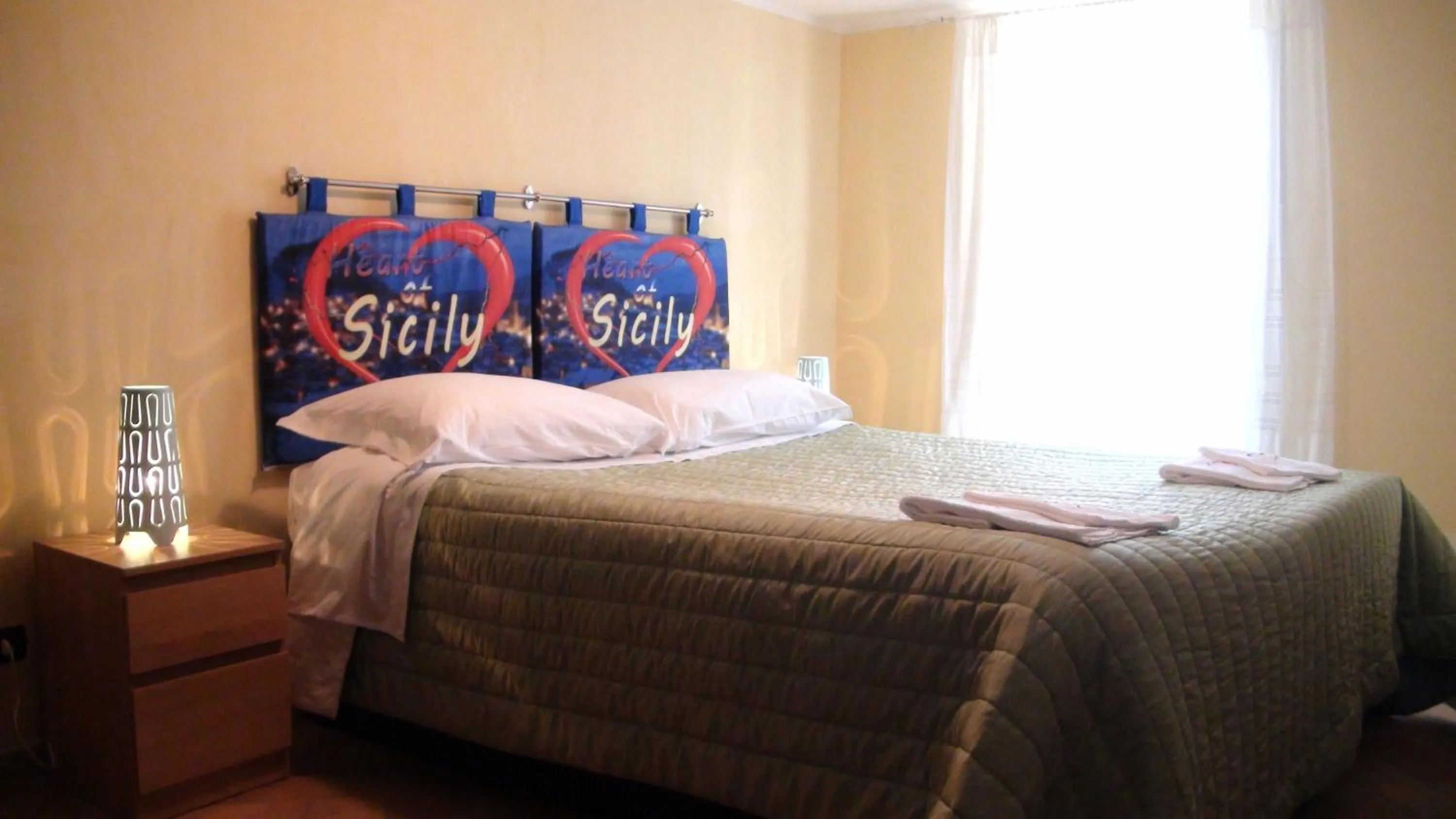 Photo of the whole room, Bed in Heart Of Sicily