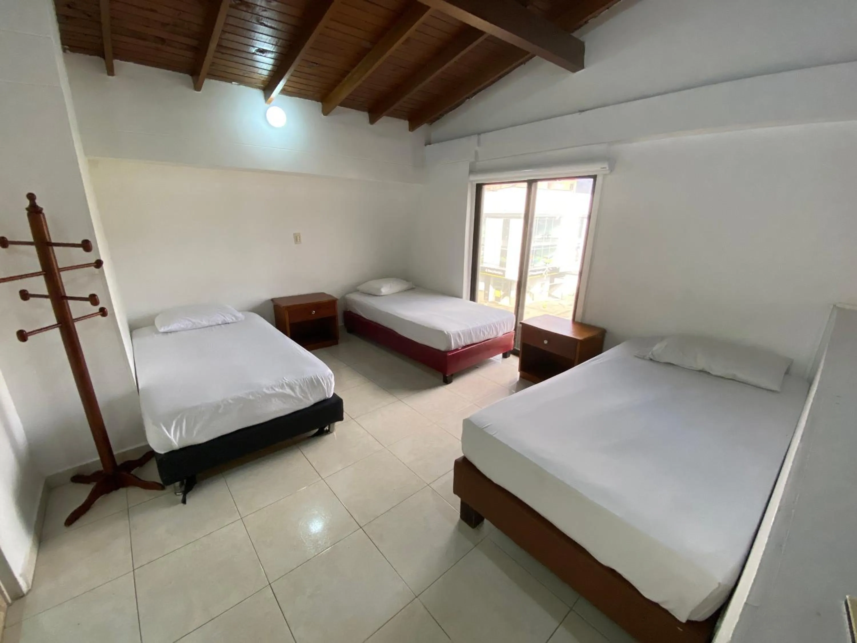 Photo of the whole room, Bed in Hotel Laureles 70