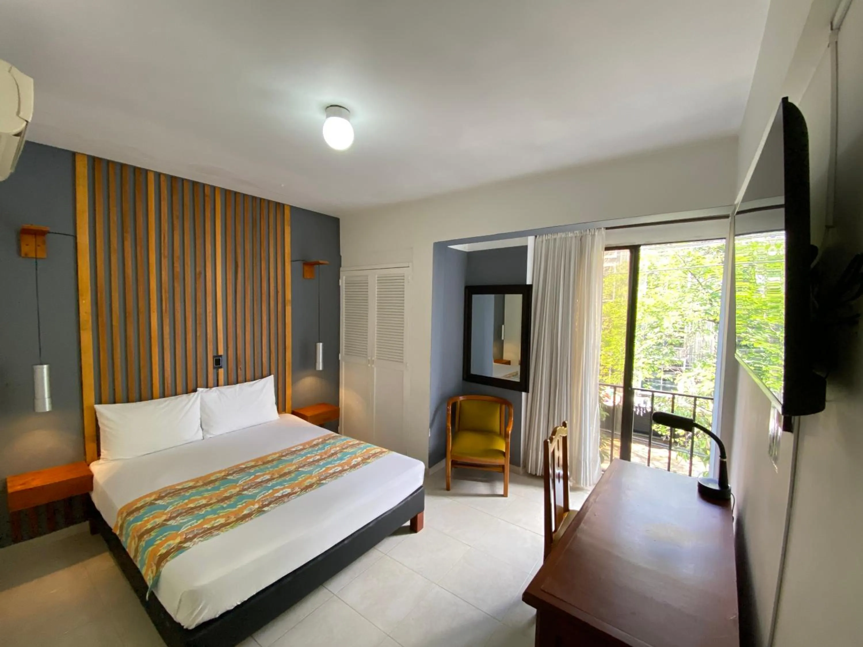 Bedroom, Bed in Hotel Laureles 70