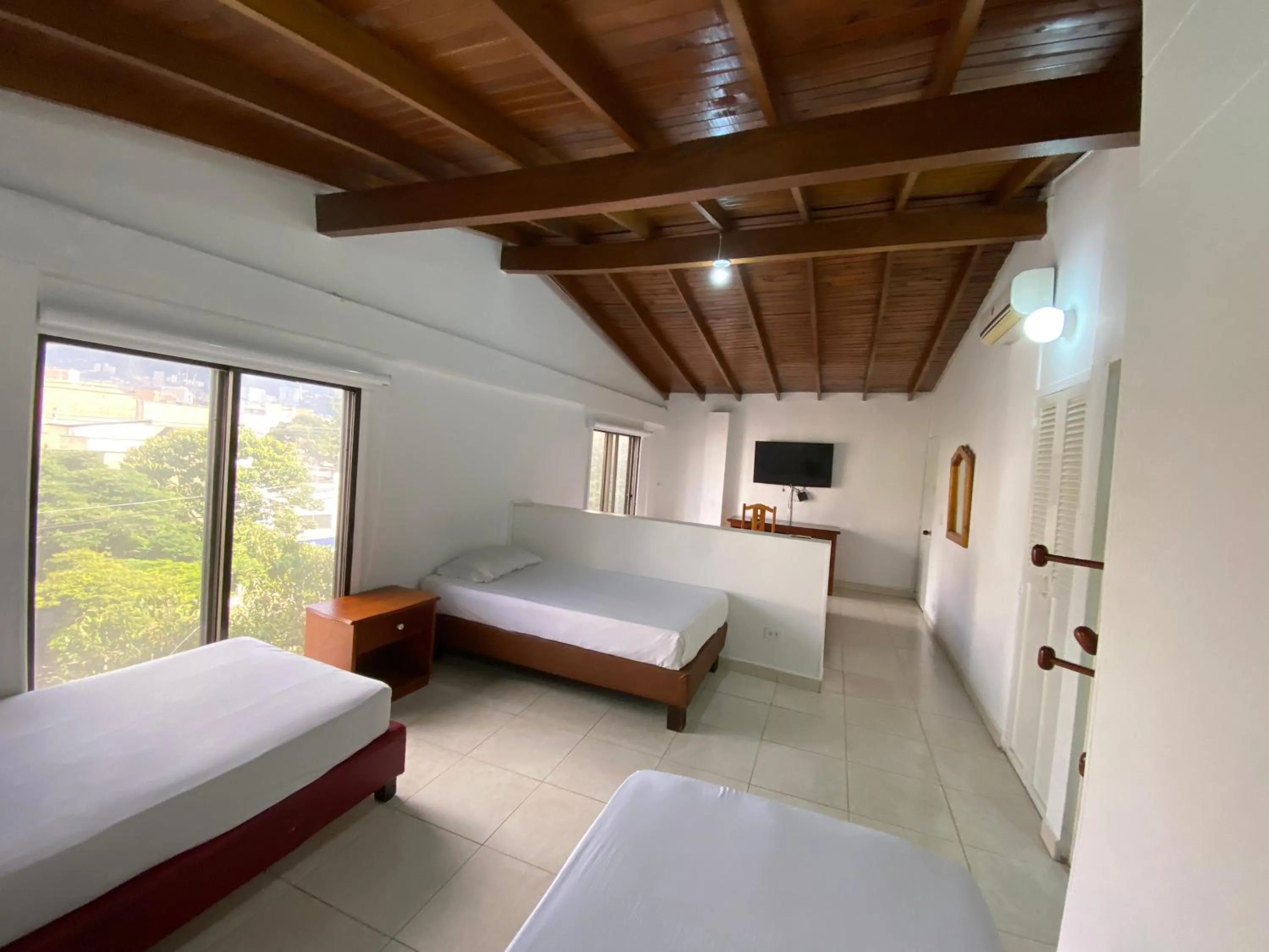 Bedroom, Bed in Hotel Laureles 70