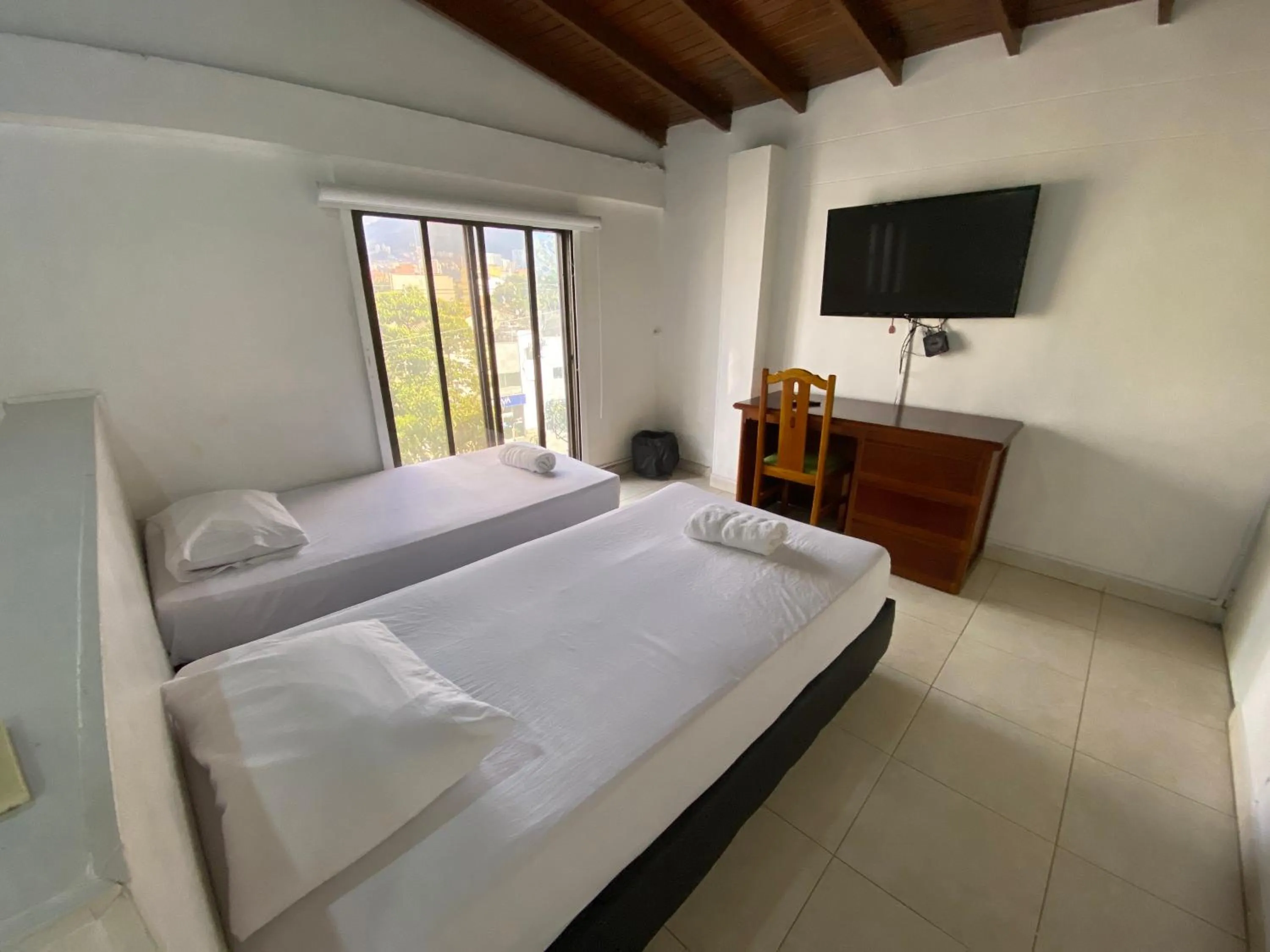 Bedroom, Bed in Hotel Laureles 70