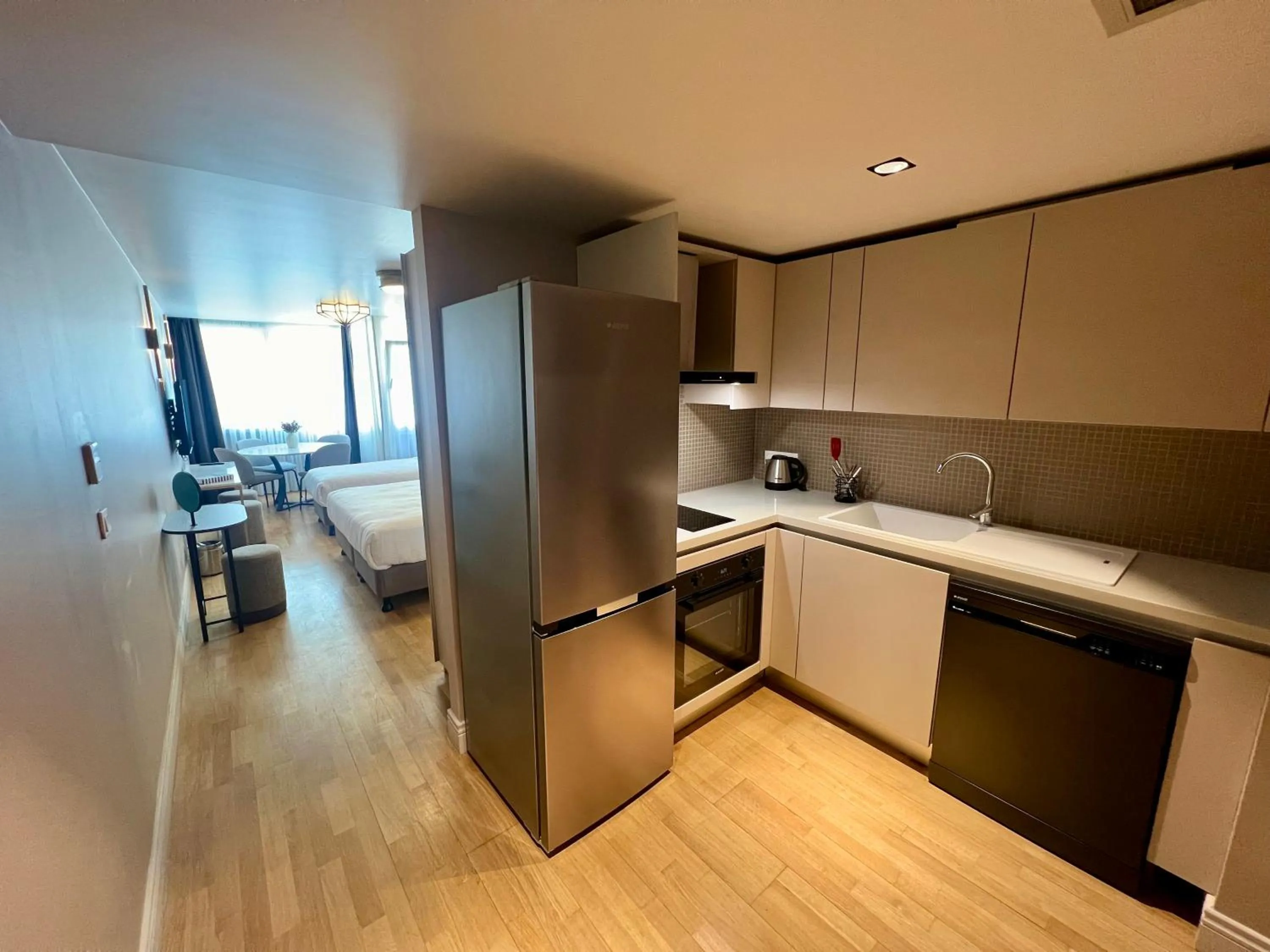 Kitchen or kitchenette in Weingart Suites Hotel