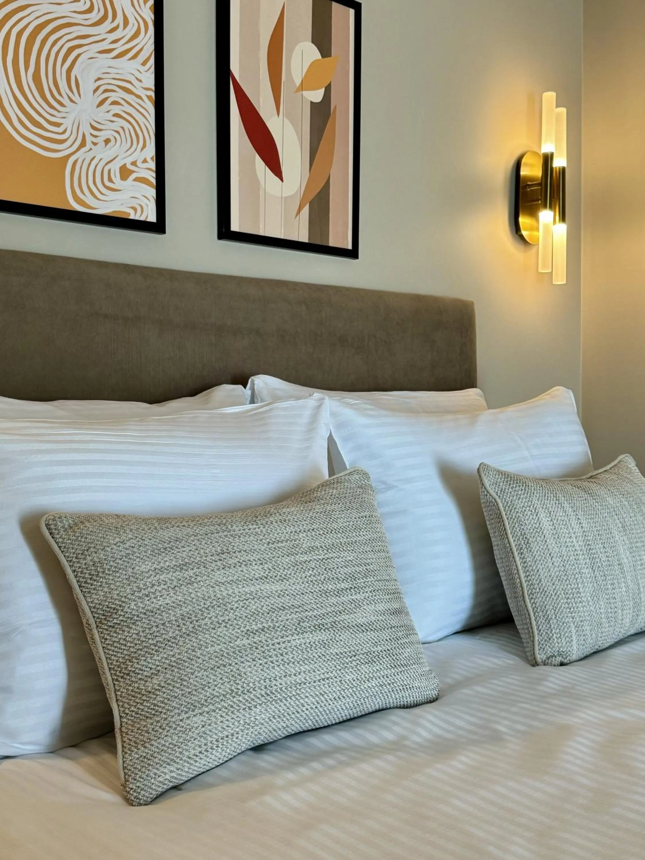 Bed in Weingart Suites Hotel