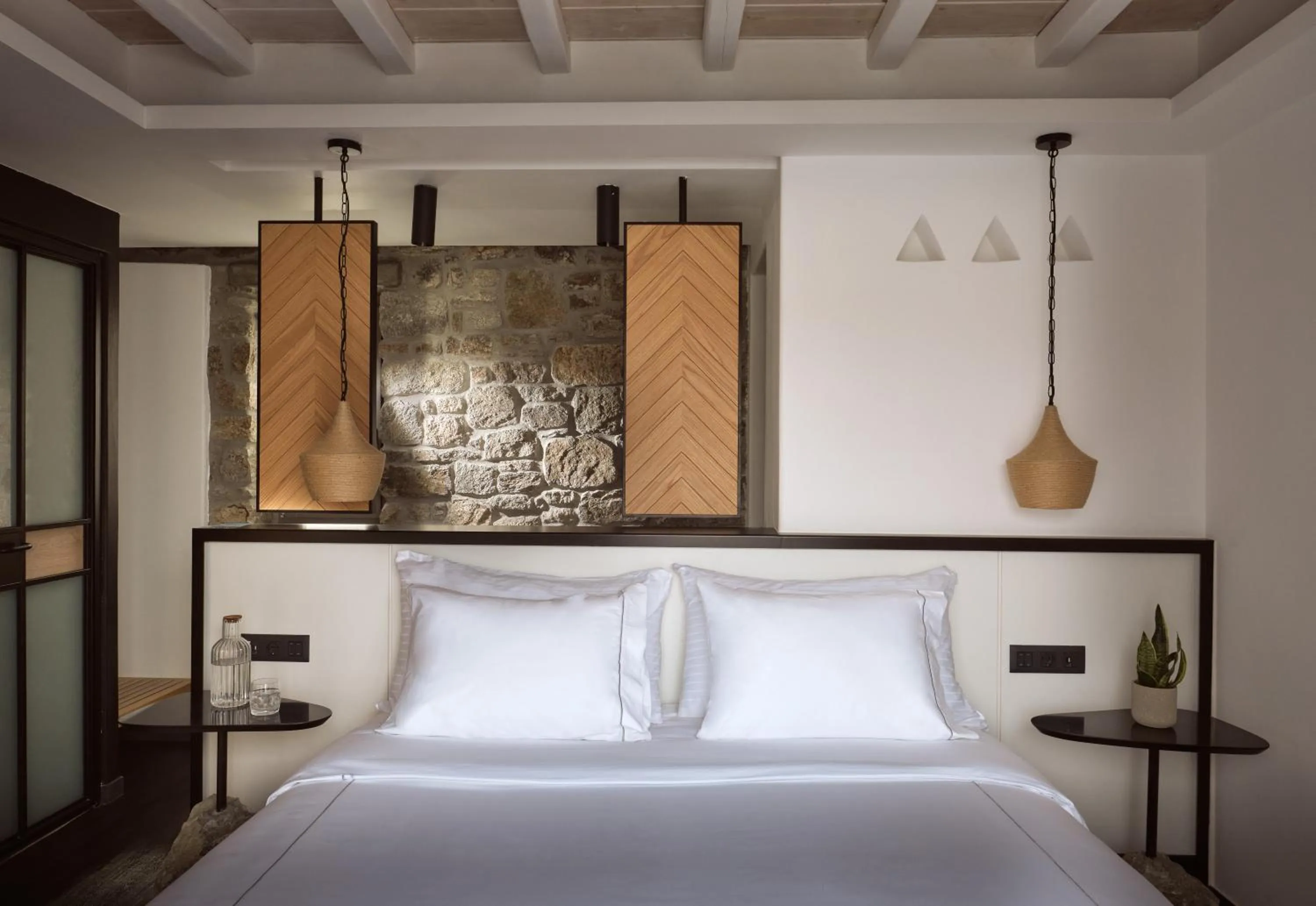 Bed in Semeli Coast Mykonos Curio Collection by Hilton