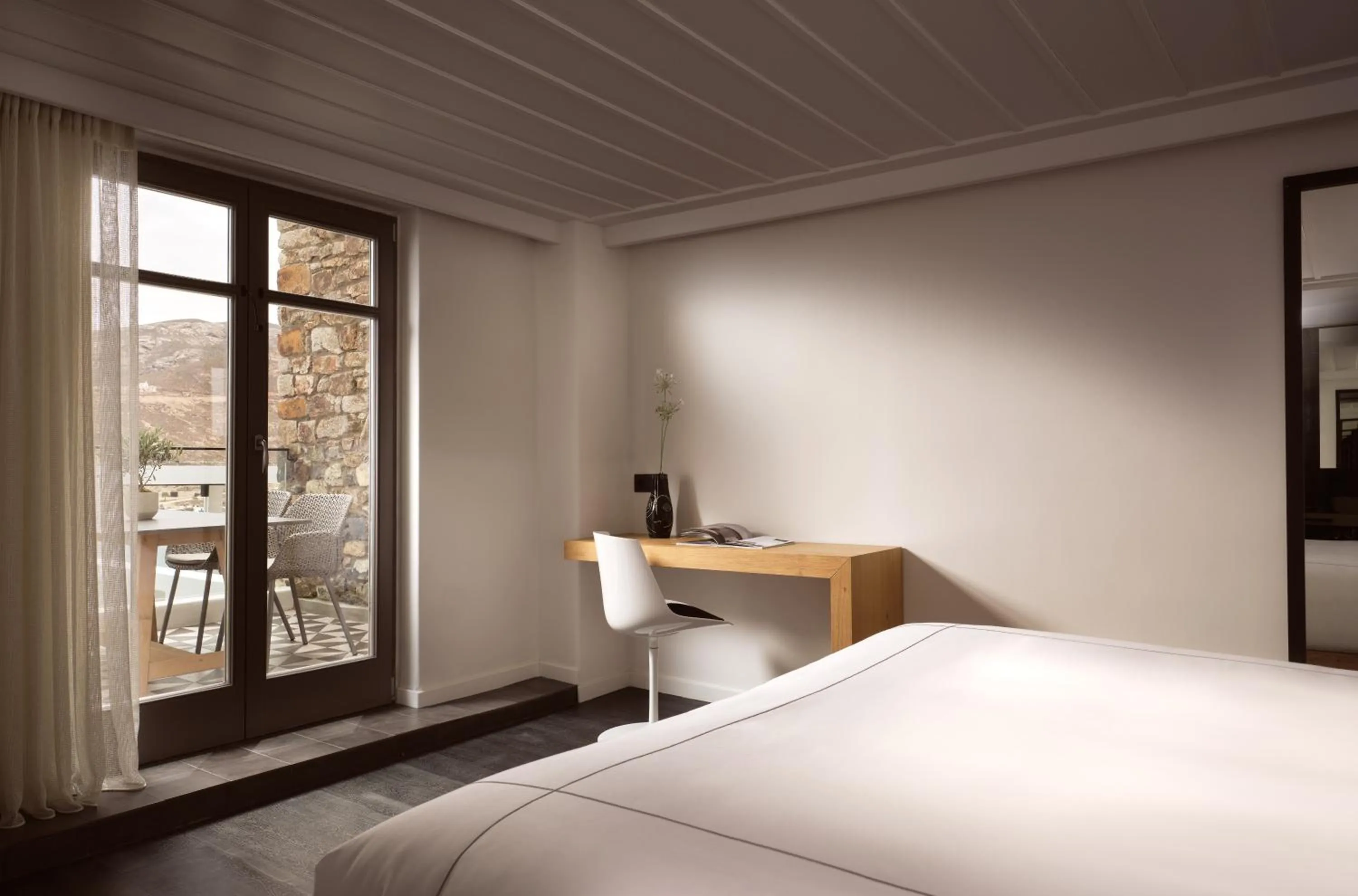 Bed in Semeli Coast Mykonos Curio Collection by Hilton