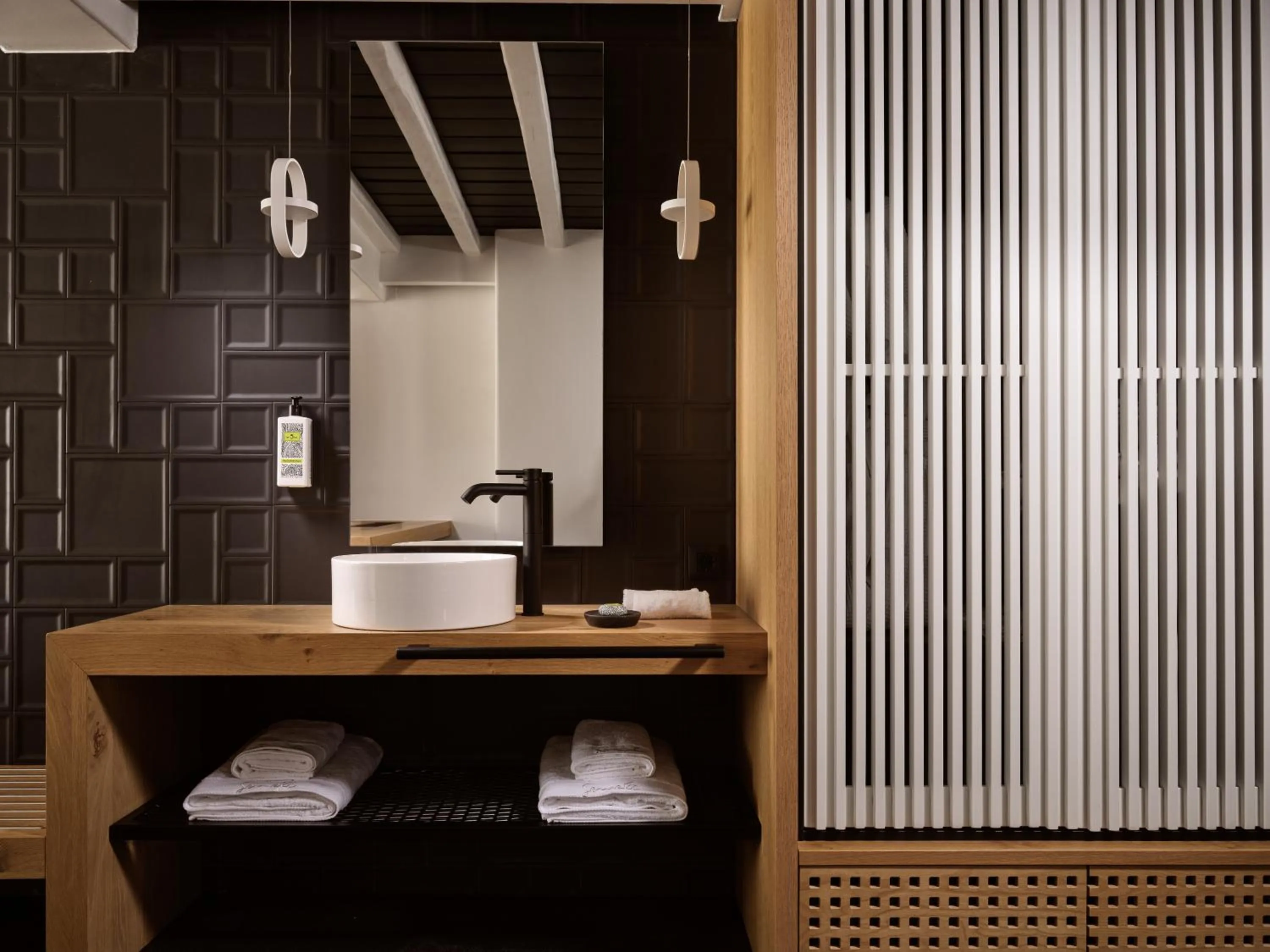 Bathroom in Semeli Coast Mykonos Curio Collection by Hilton