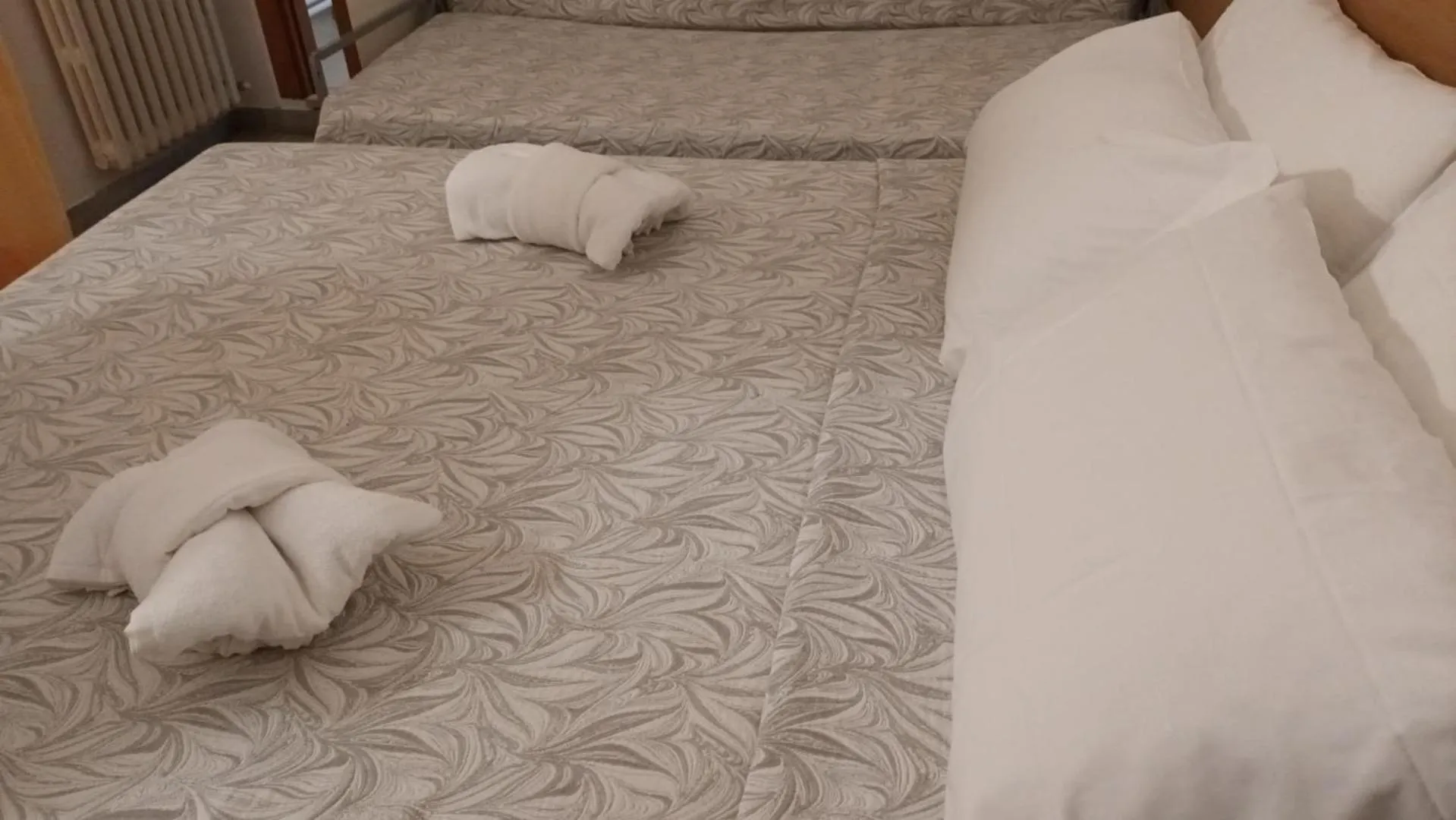 Bed in HOTEL HALF MOON RESTAURANT