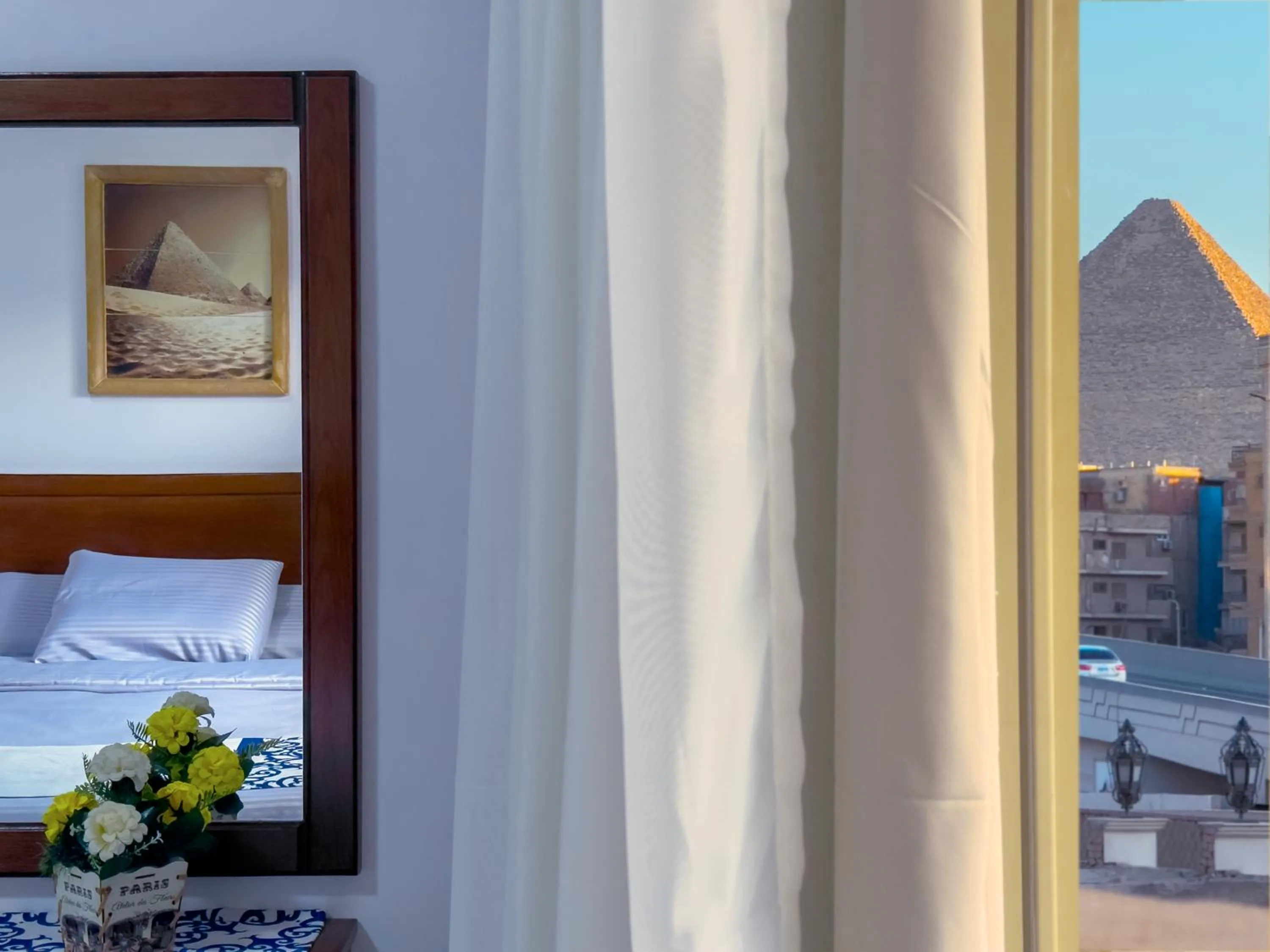 Bed in Royal Crown Hotel Giza Pyramids View