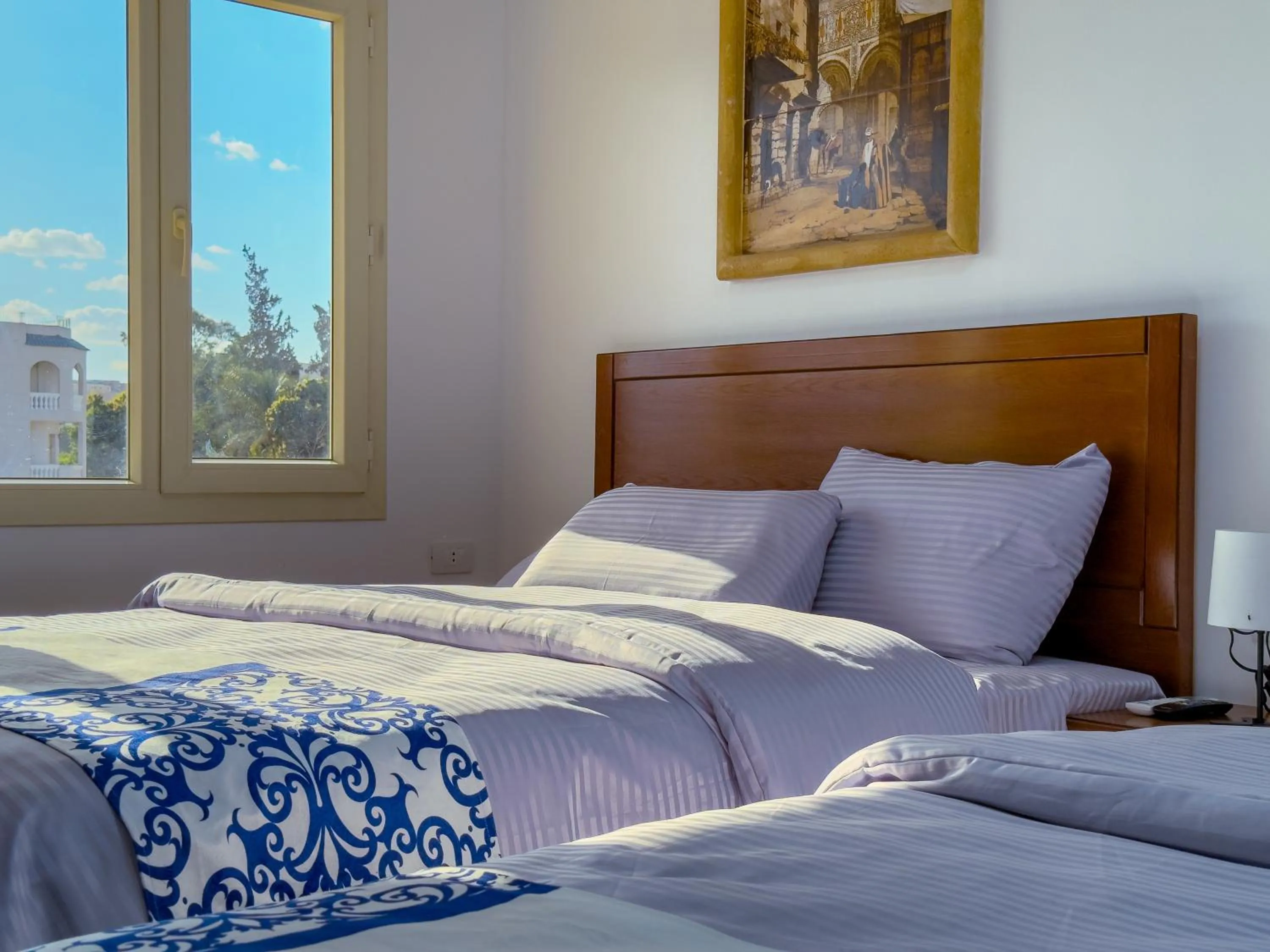 Bed in Royal Crown Hotel Giza Pyramids View