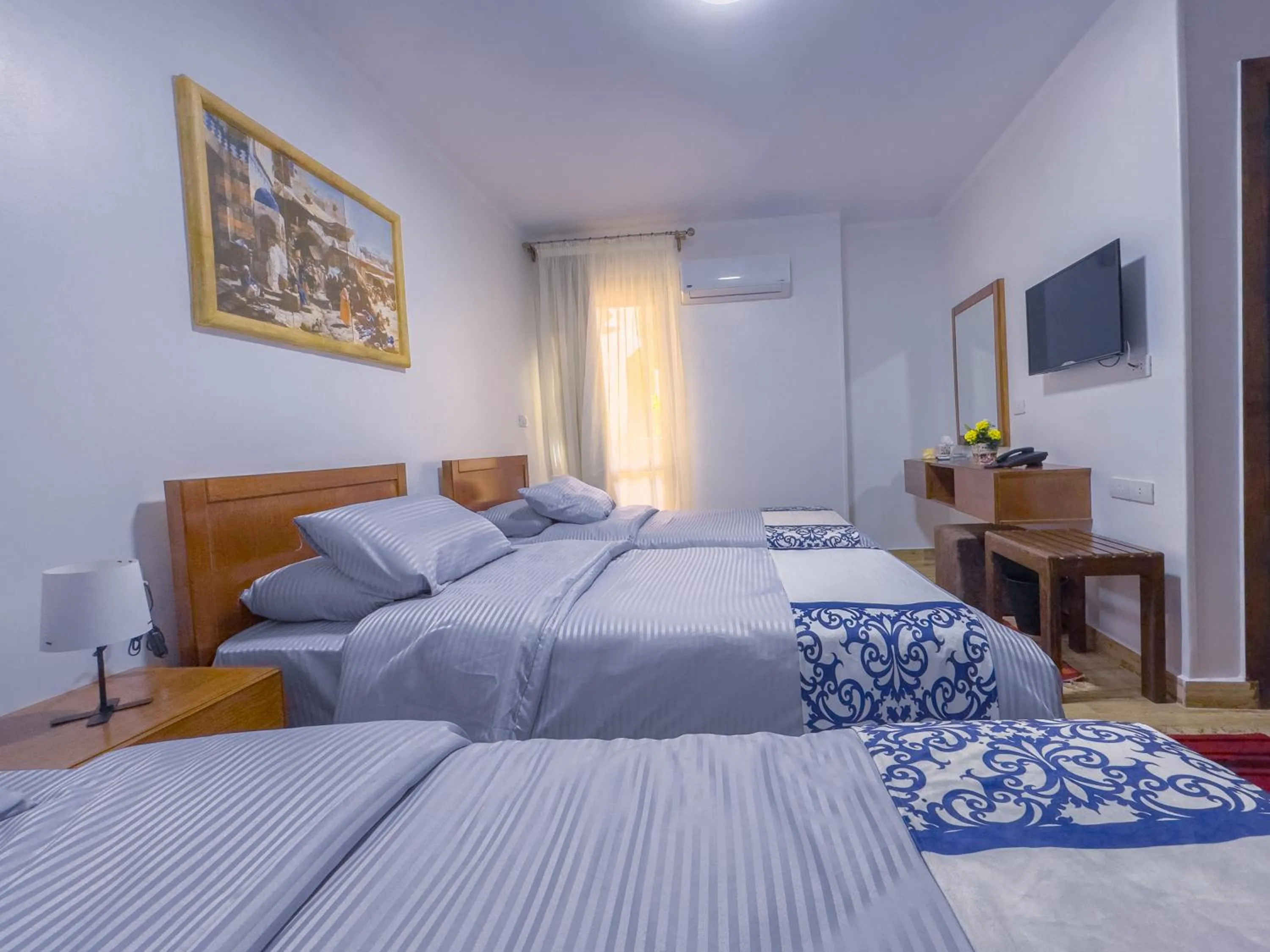 Bed in Royal Crown Hotel Giza Pyramids View