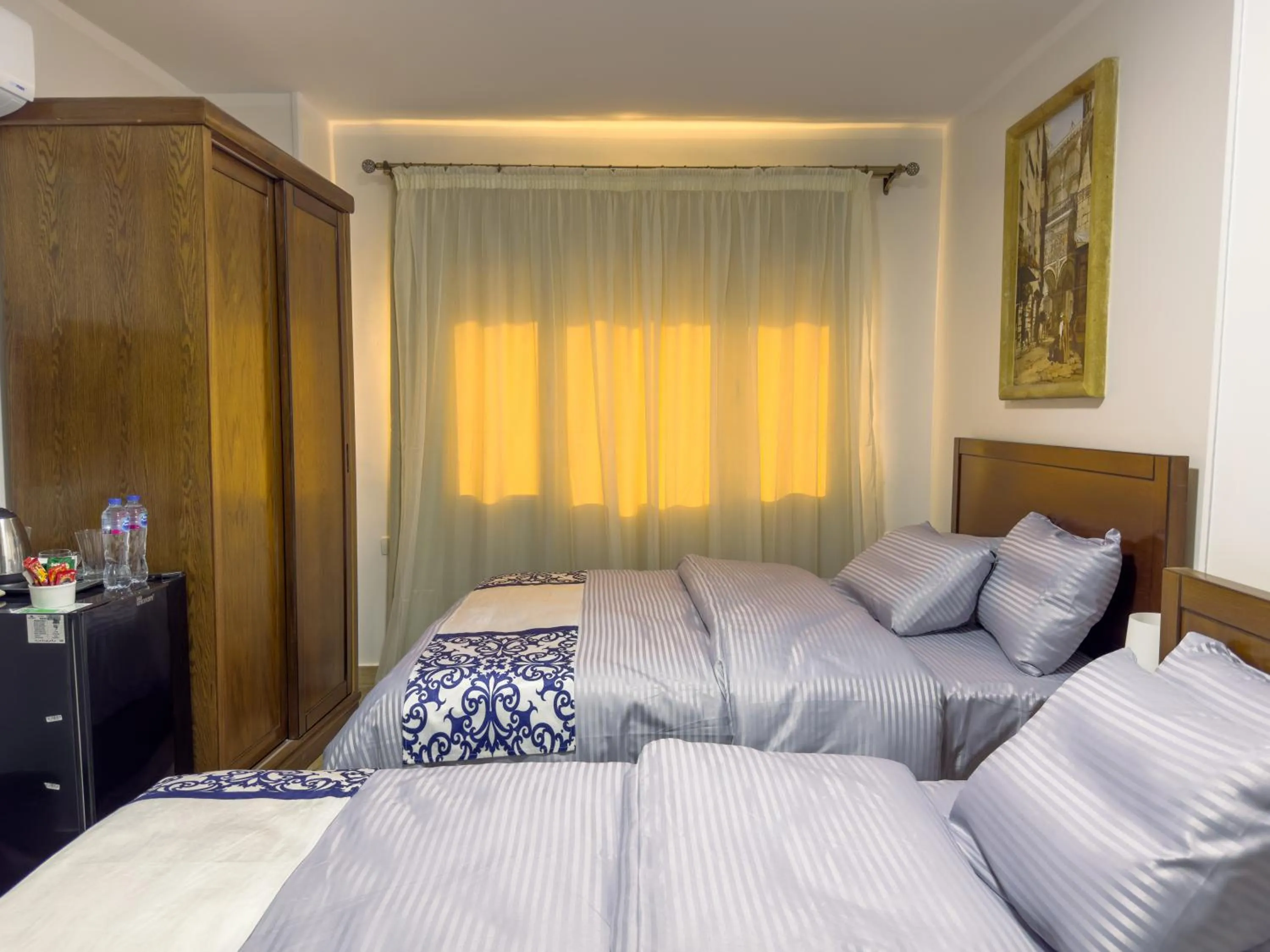 Bed in Royal Crown Hotel Giza Pyramids View