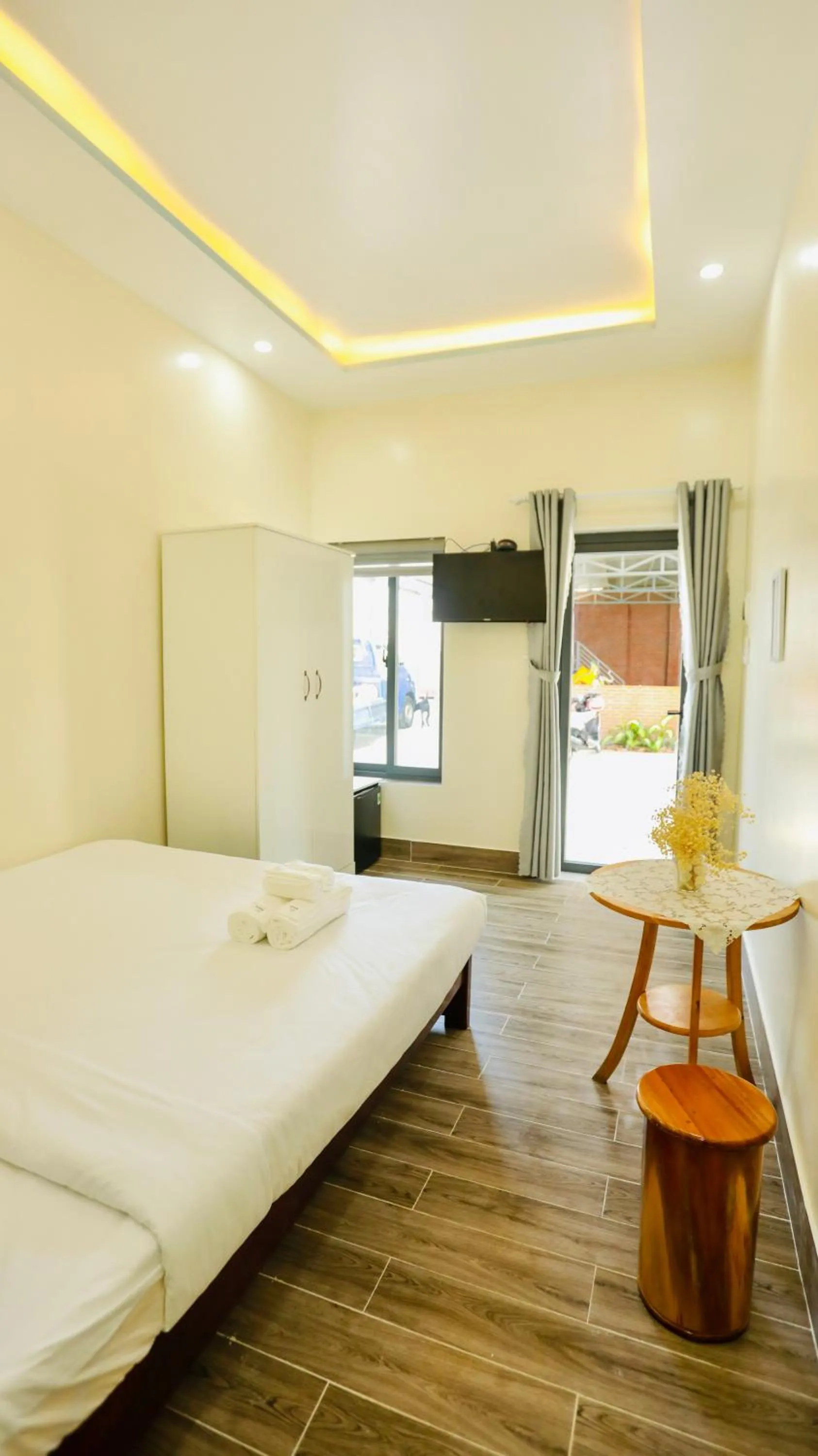 Photo of the whole room, Bed in Kiwi's Homestay & Cafe