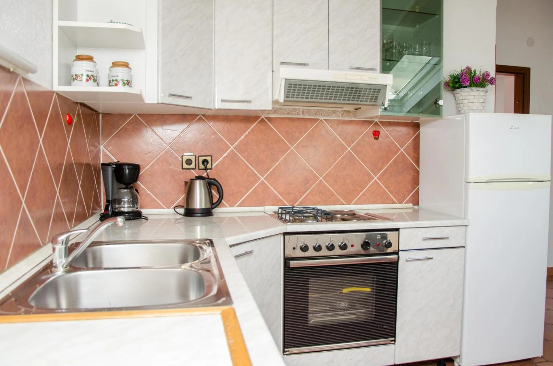 Kitchen or kitchenette in Guesthouse Ruža - apartments