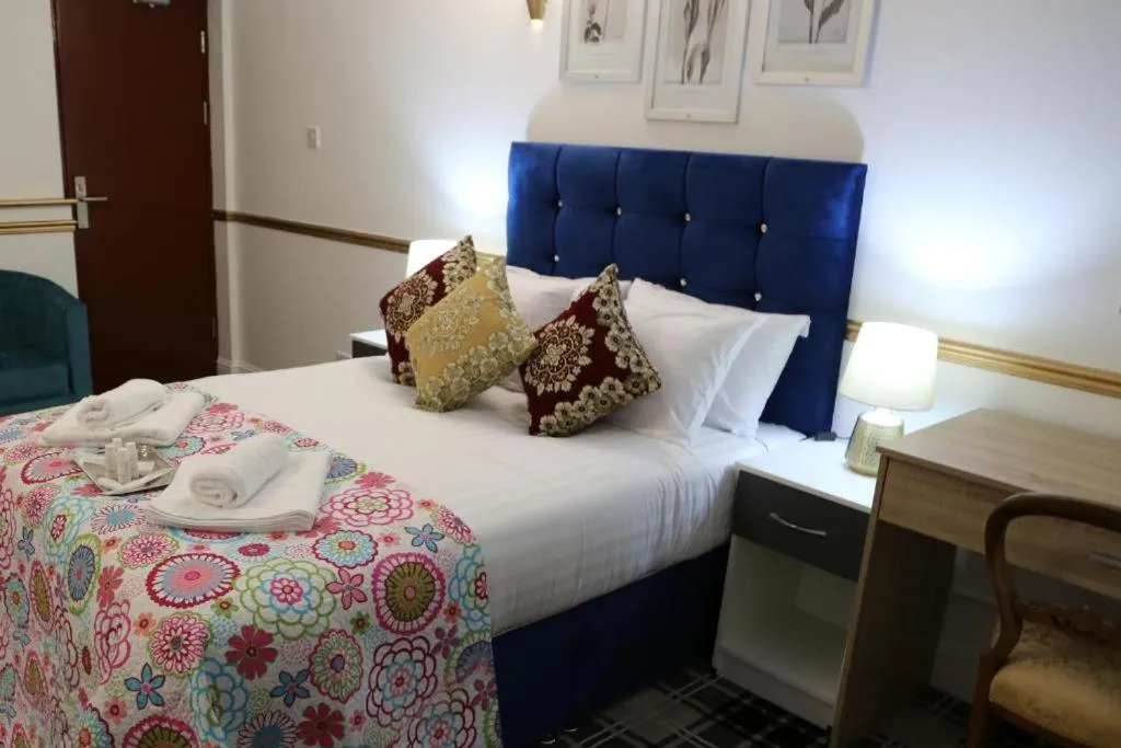 Bedroom in OYO 4 Sisters Inn