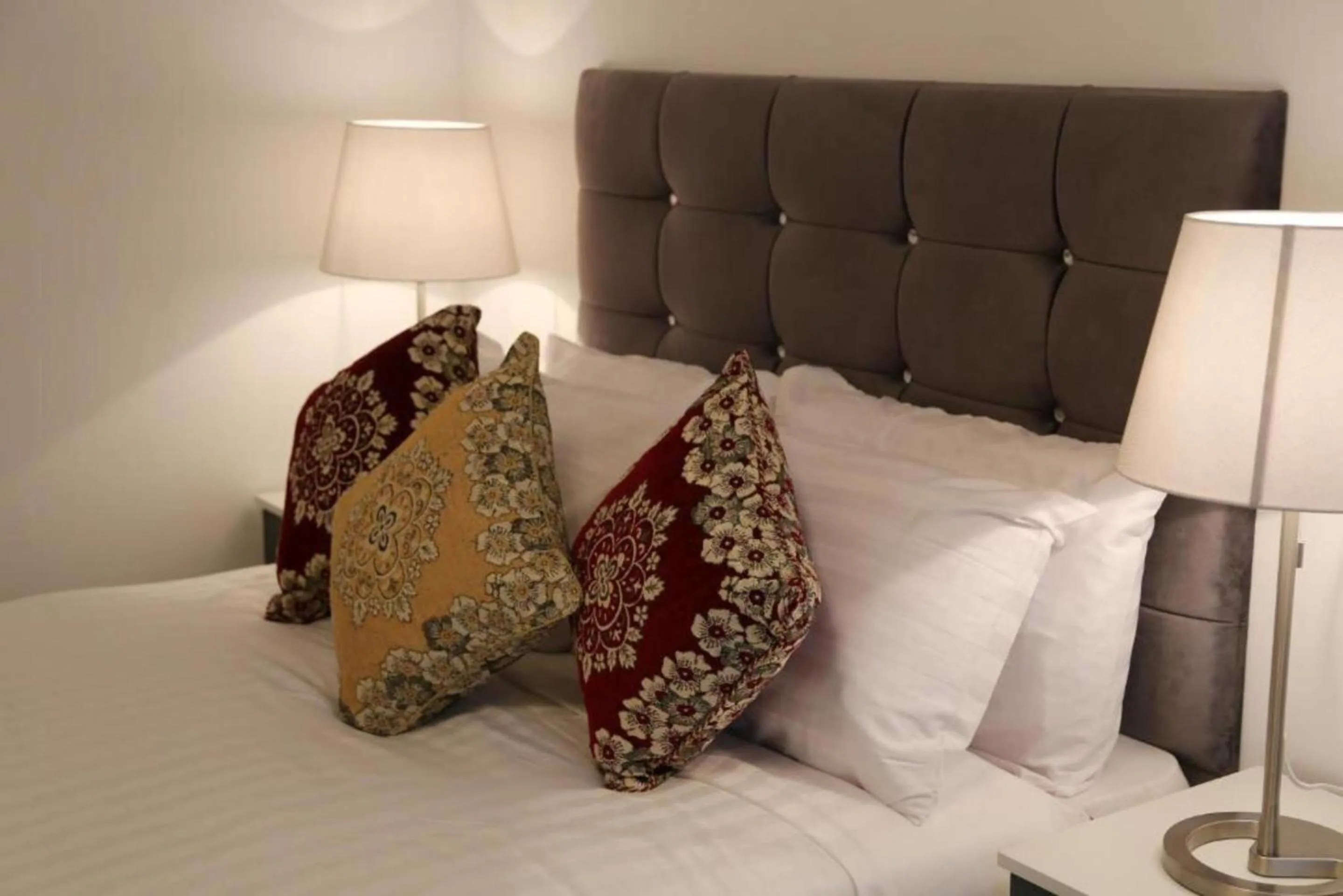 Bedroom in OYO 4 Sisters Inn