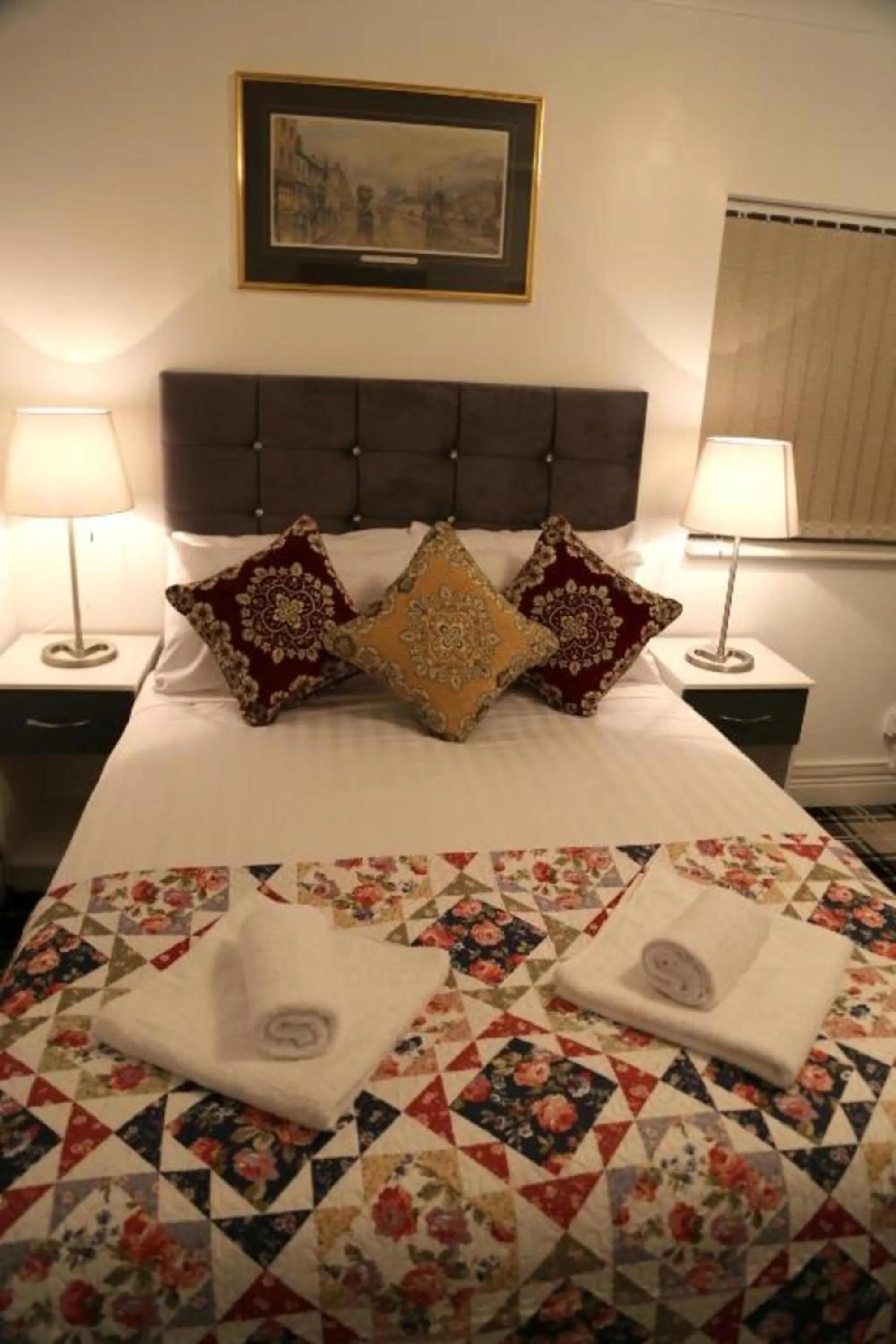 Bedroom in OYO 4 Sisters Inn