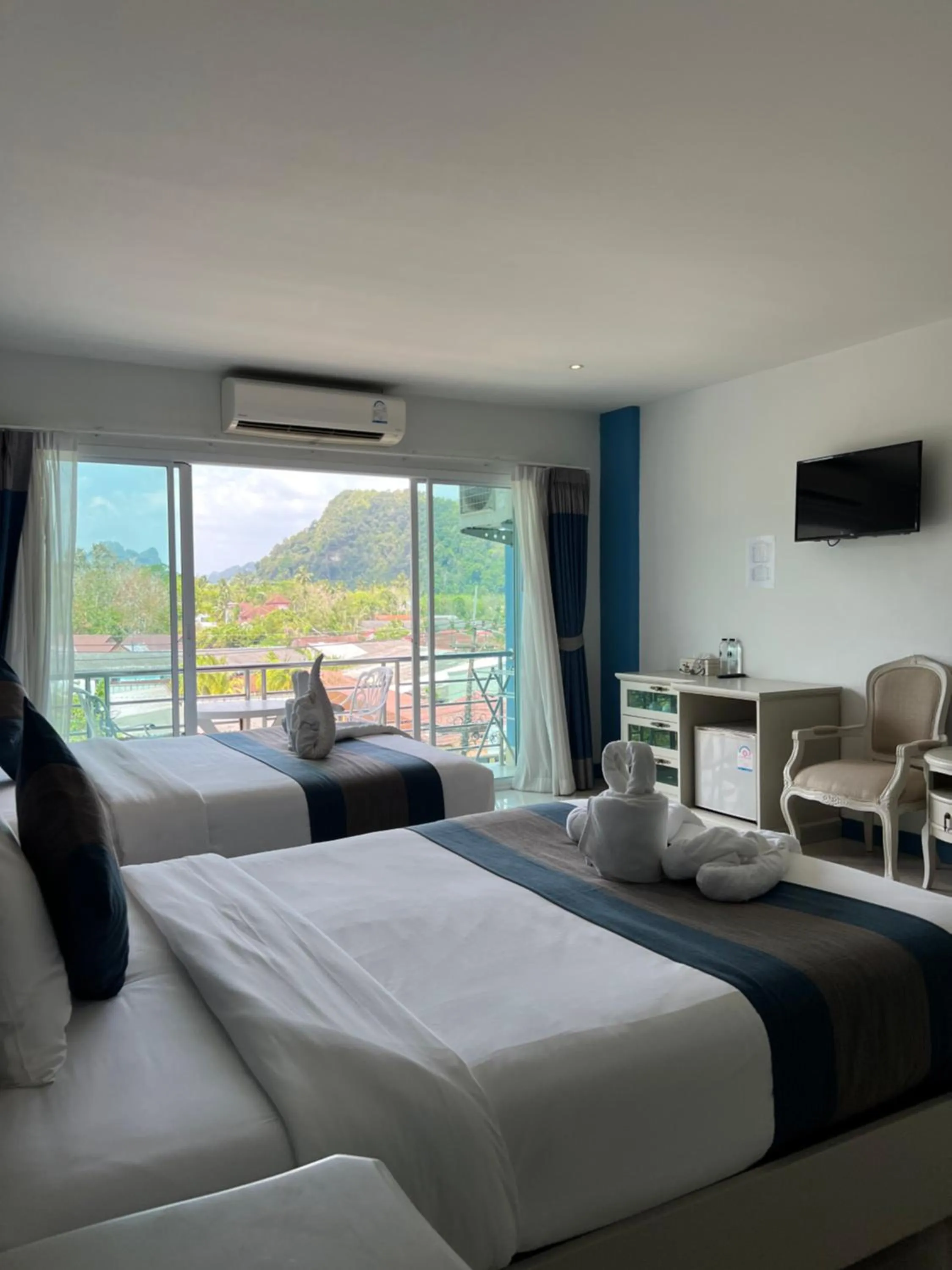 Bed in Ancora Y&W Boutique Hotel