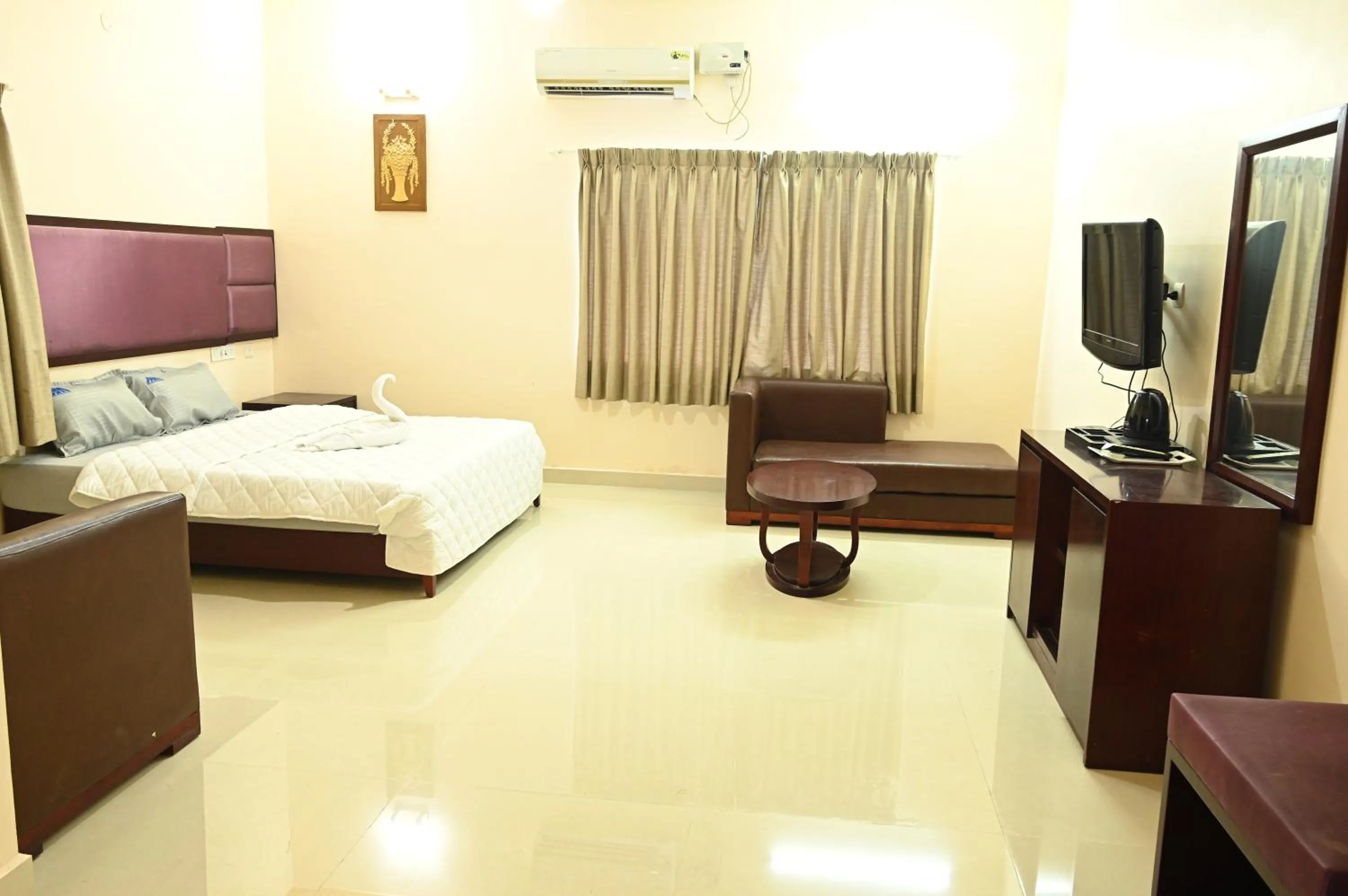 Bed in Athithi Resorts