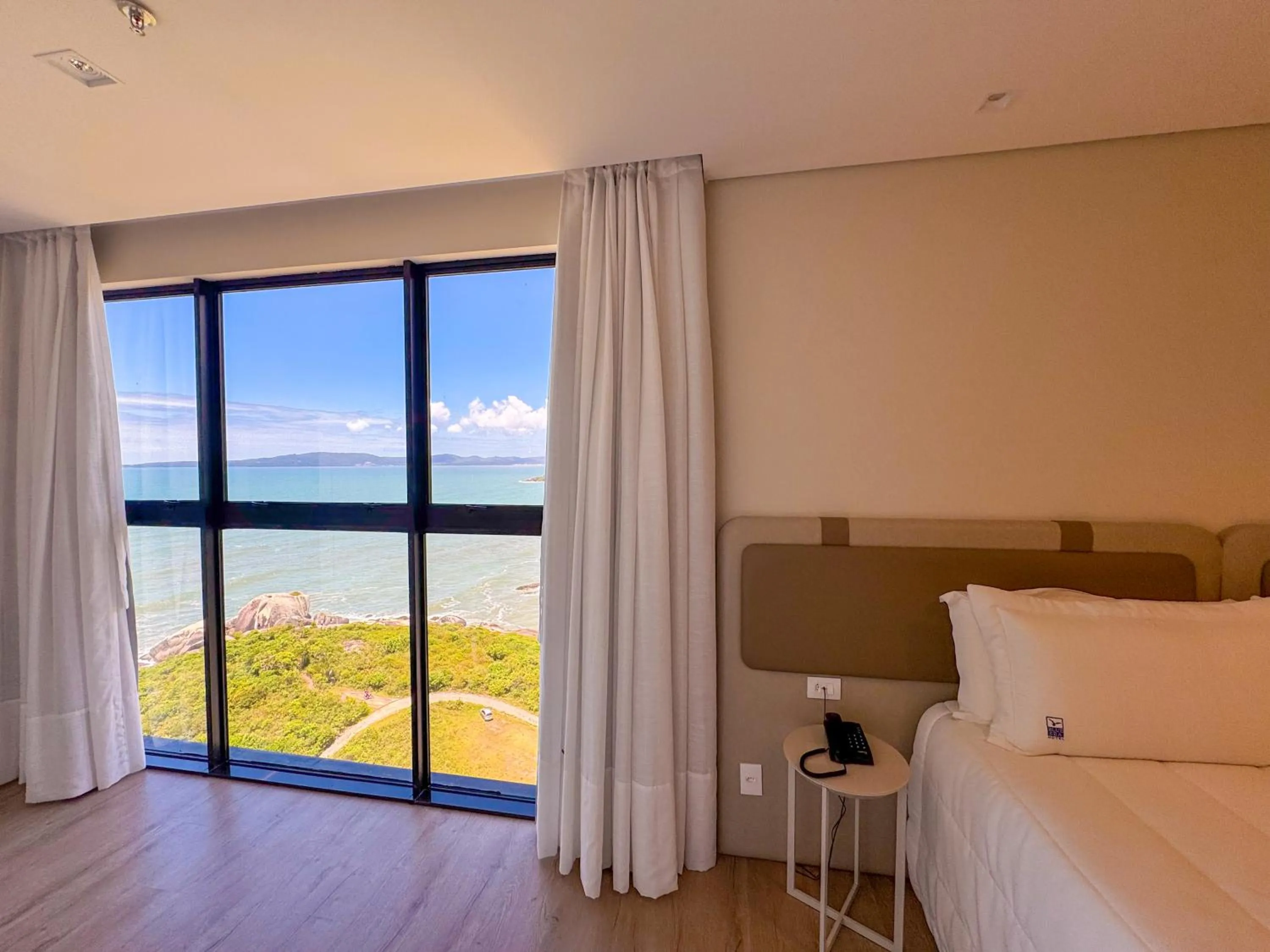 View (from property/room), Bed in Blue Sea Hotel